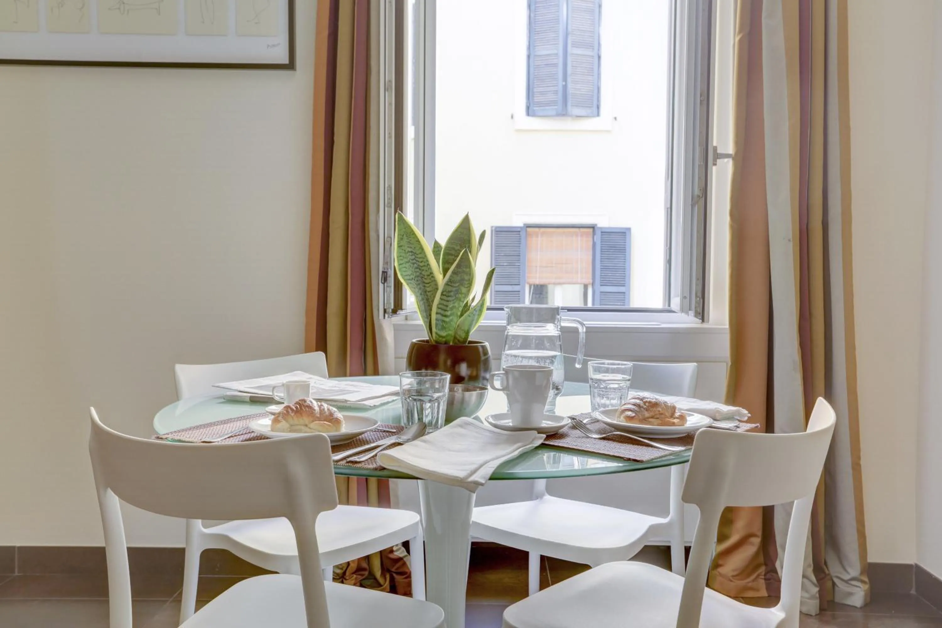 Dining area in Colosseo Gardens - My Extra Home