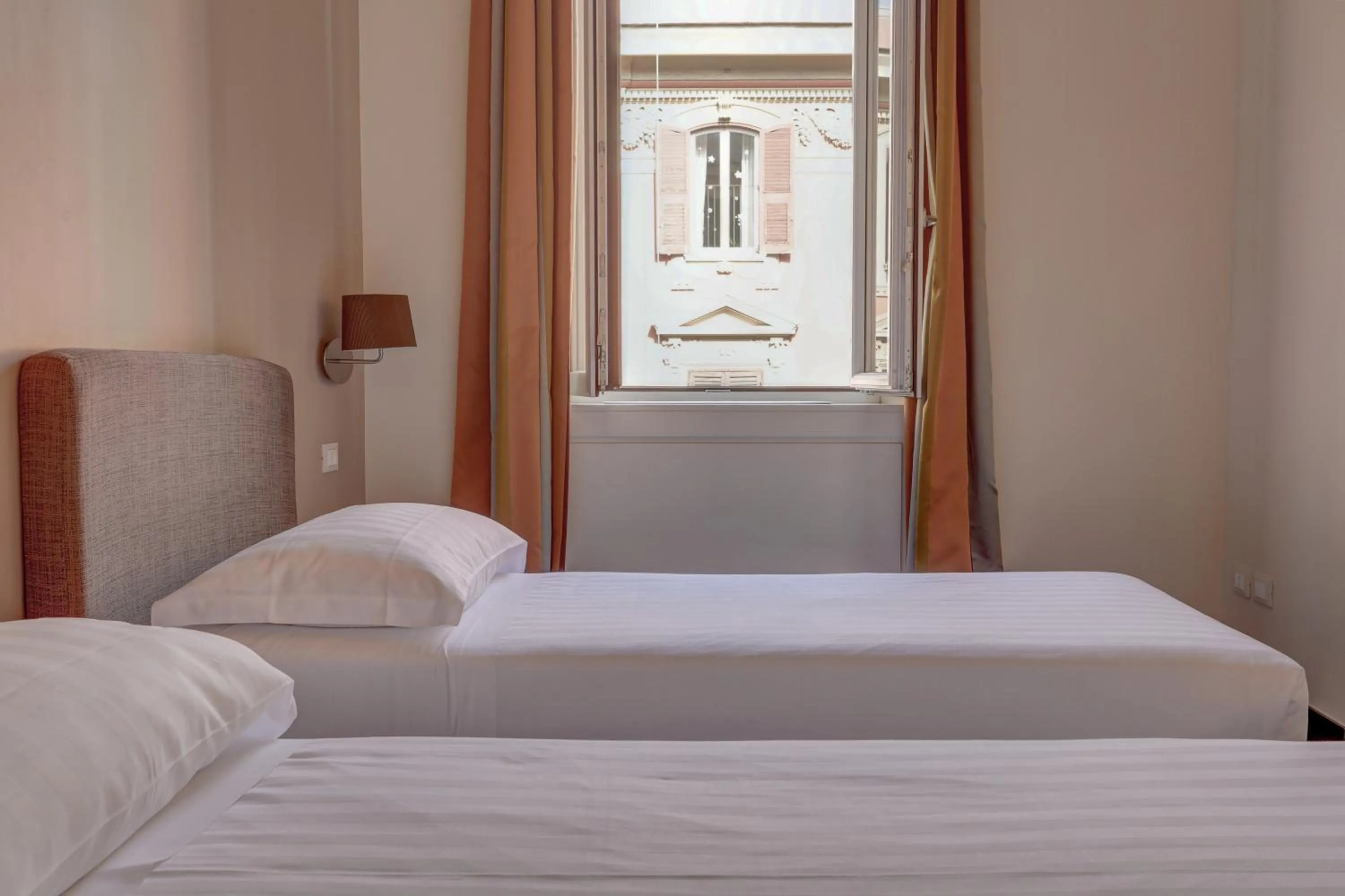 Bed in Colosseo Gardens - My Extra Home