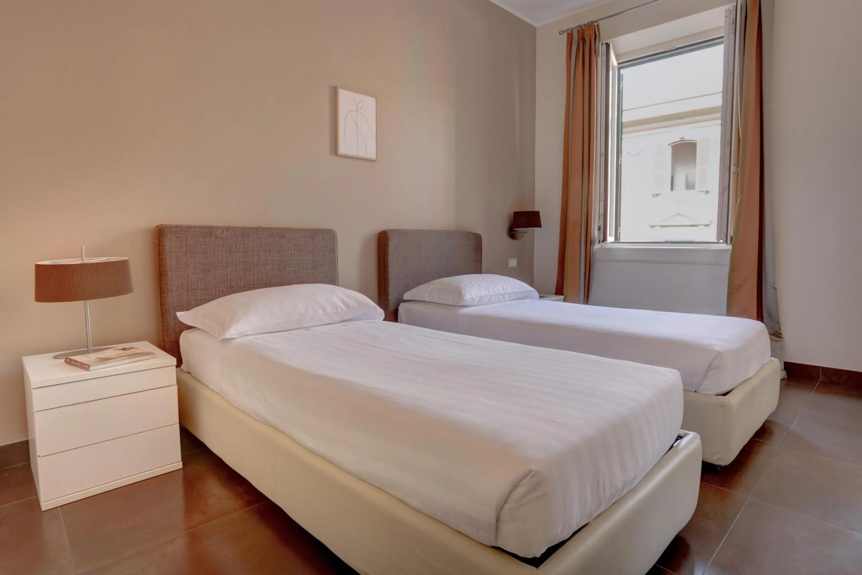 Bed in Colosseo Gardens - My Extra Home