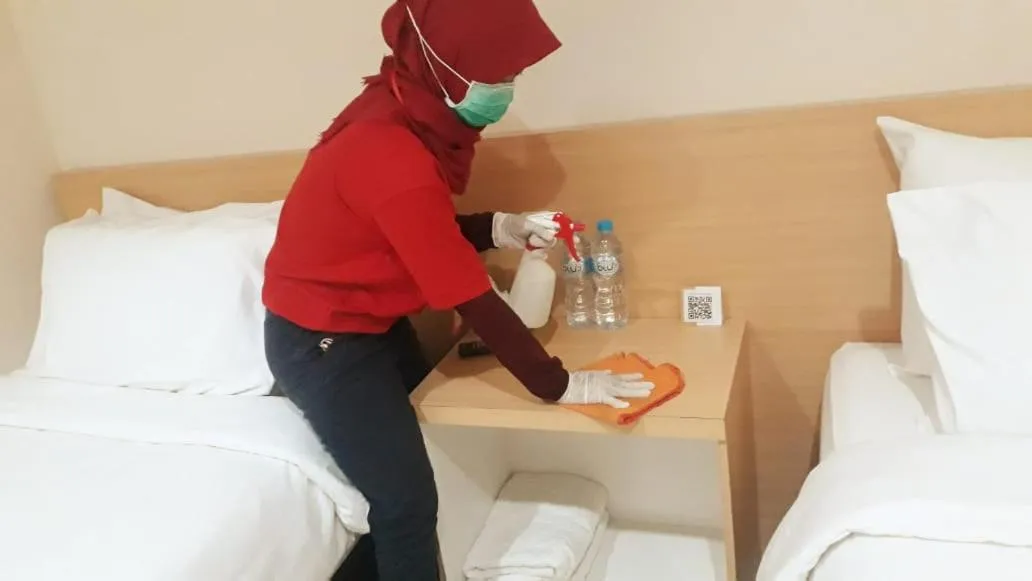 Staff, Bed in Gold Line Guest House