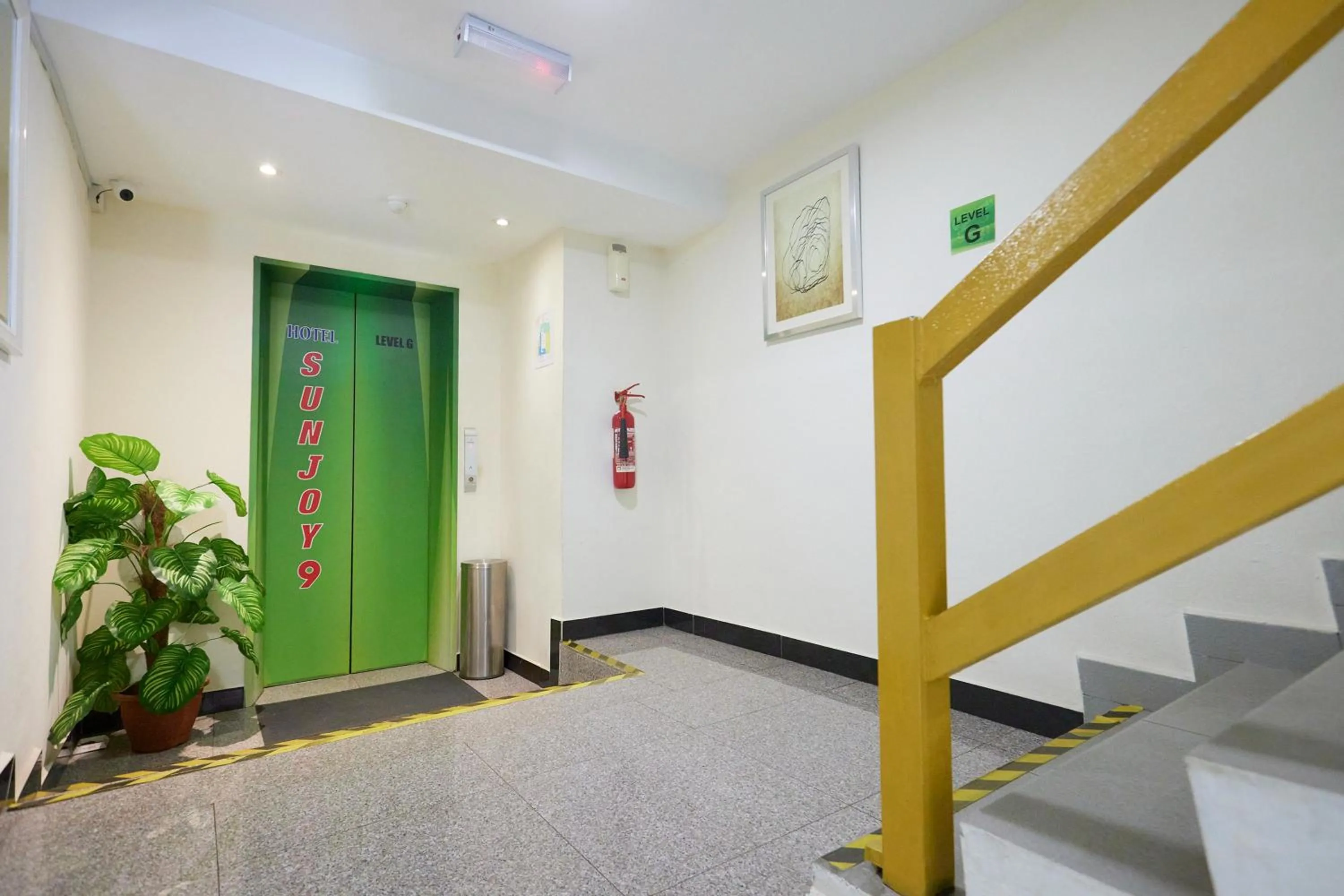 Lobby or reception in Hotel Sunjoy9 OKR