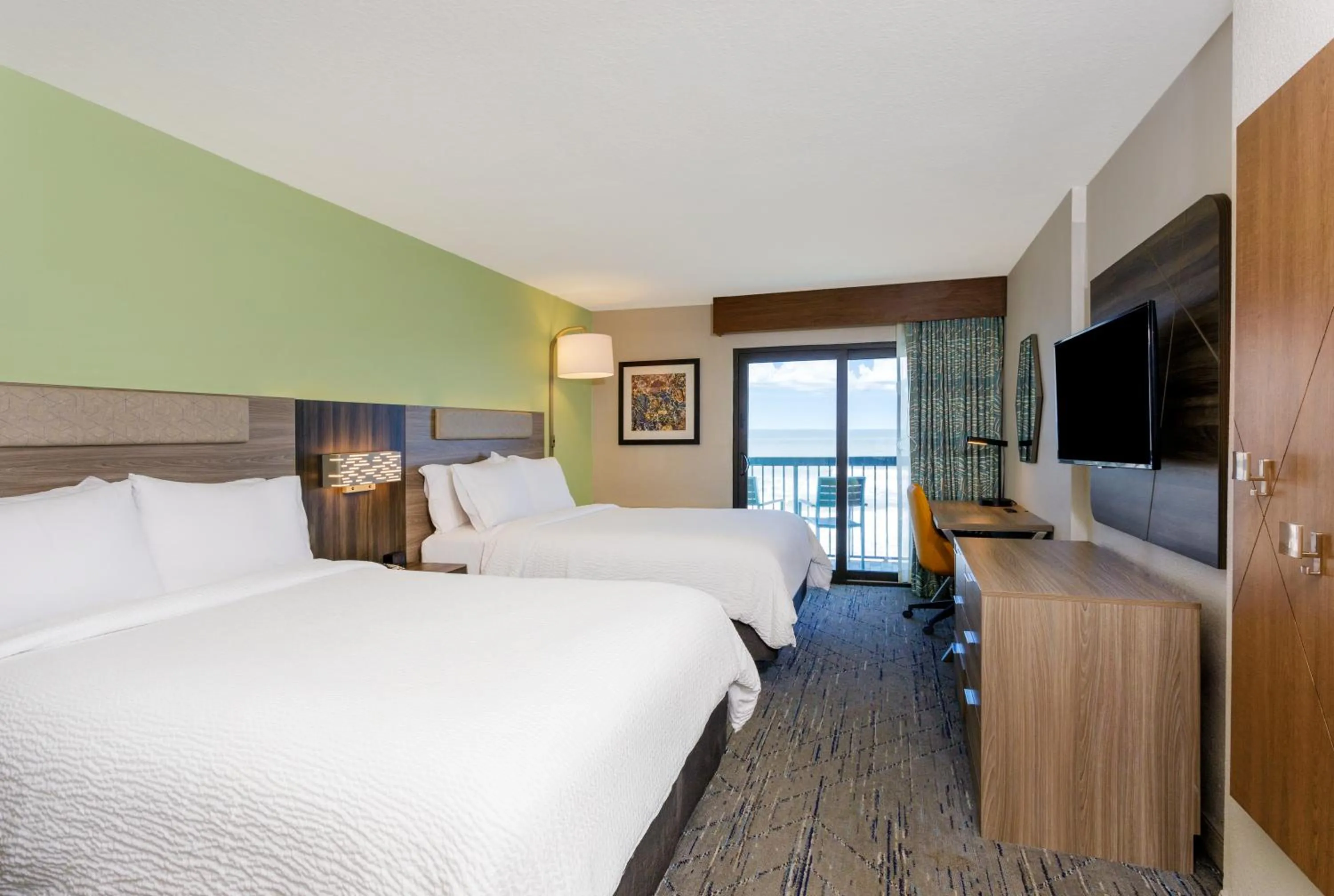 Bedroom, Bed in Holiday Inn Express & Suites Oceanfront Daytona Beach Shores by IHG