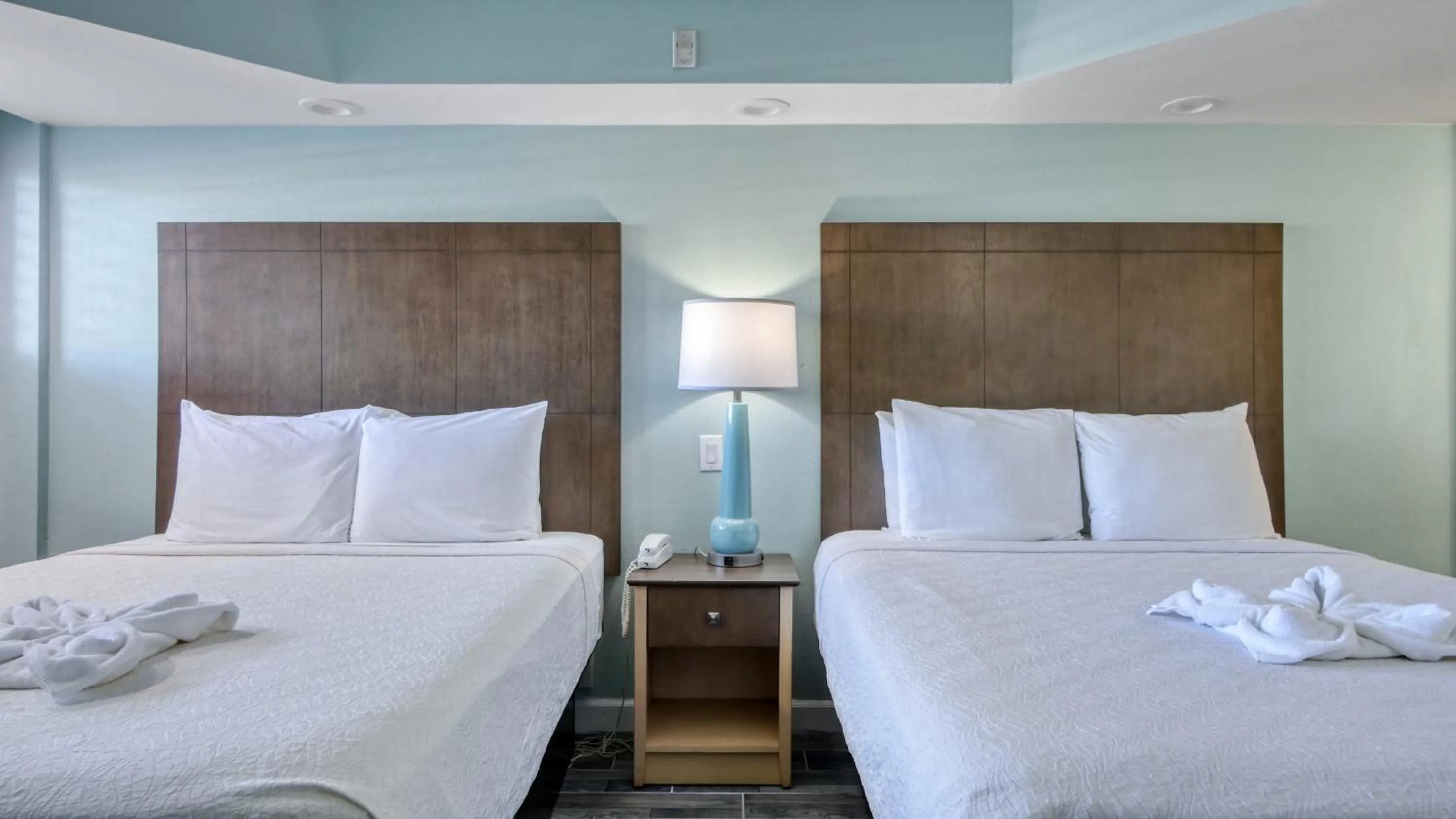 Bed in Boardwalk Inn and Suites