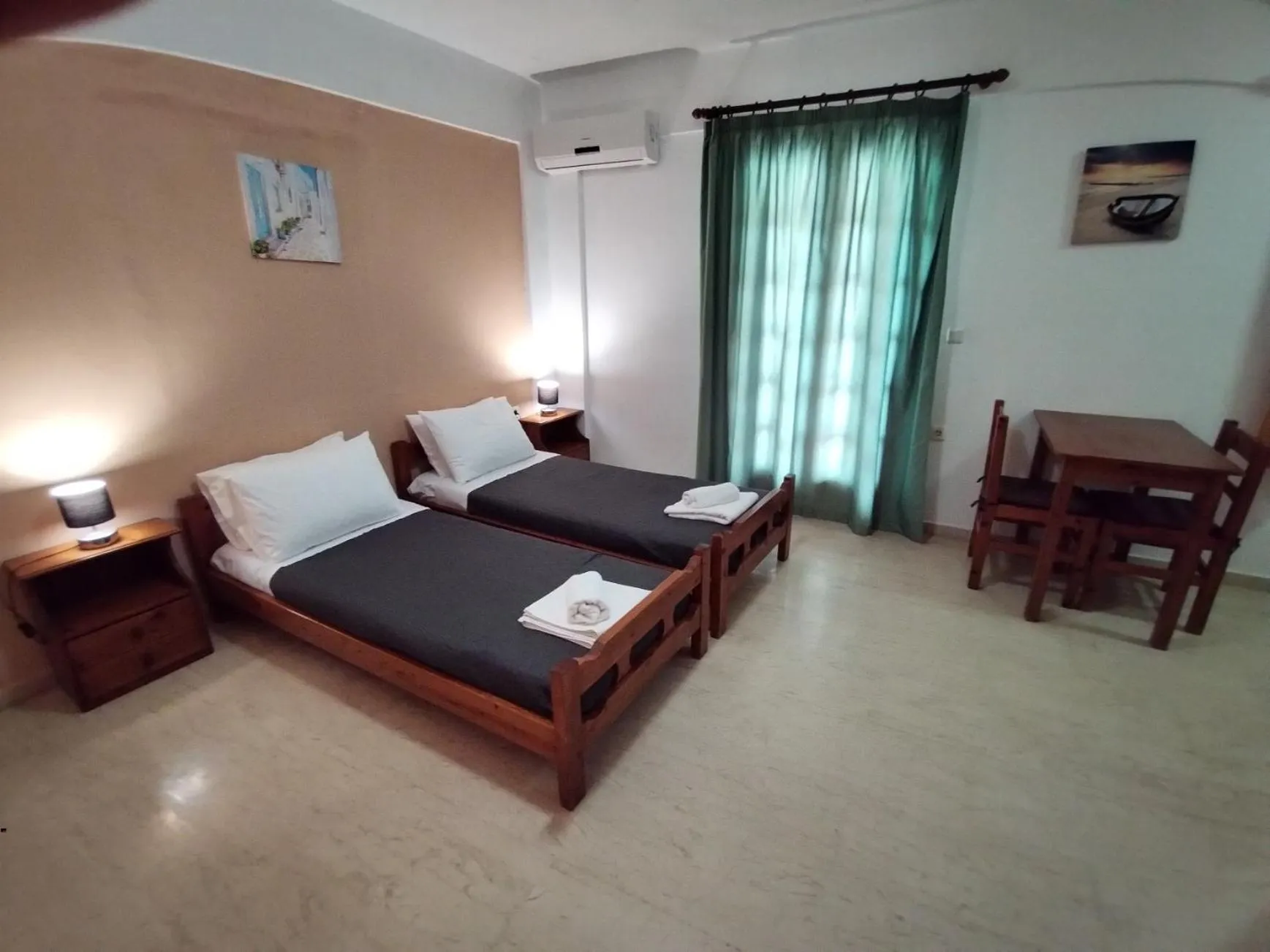 Bed in Koula Apartments