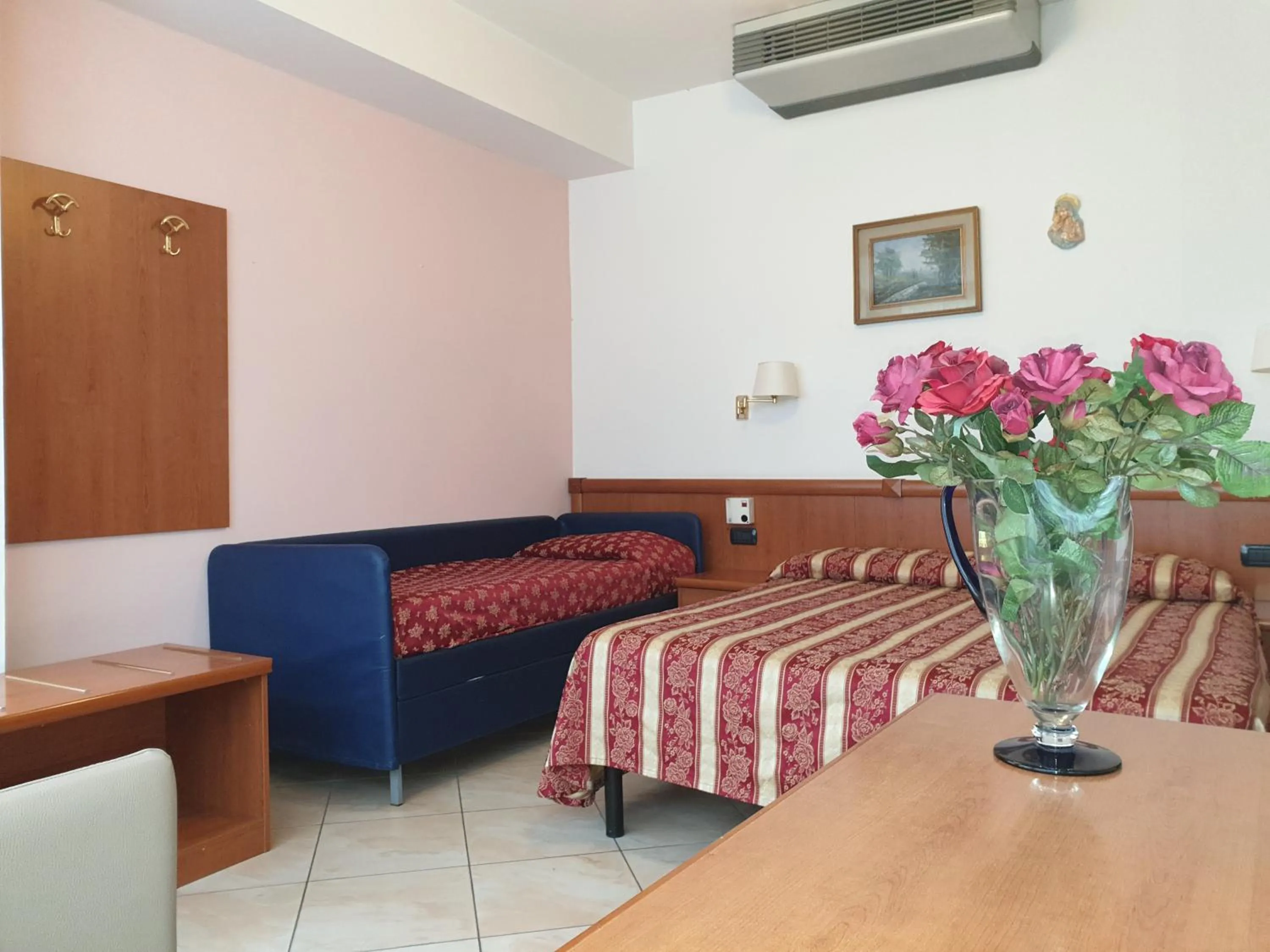 Bed in Hotel Ginevra