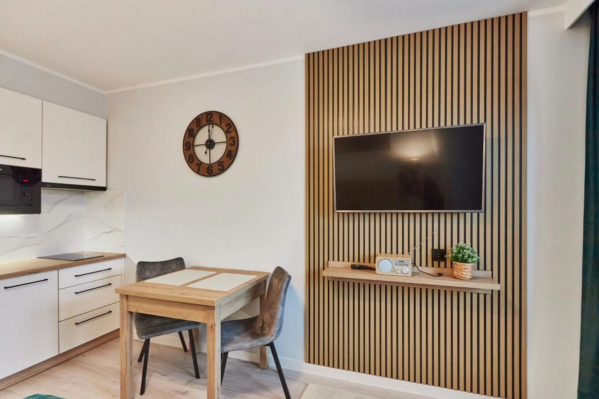 TV and multimedia in Pegaz Apartments by Baltic Home