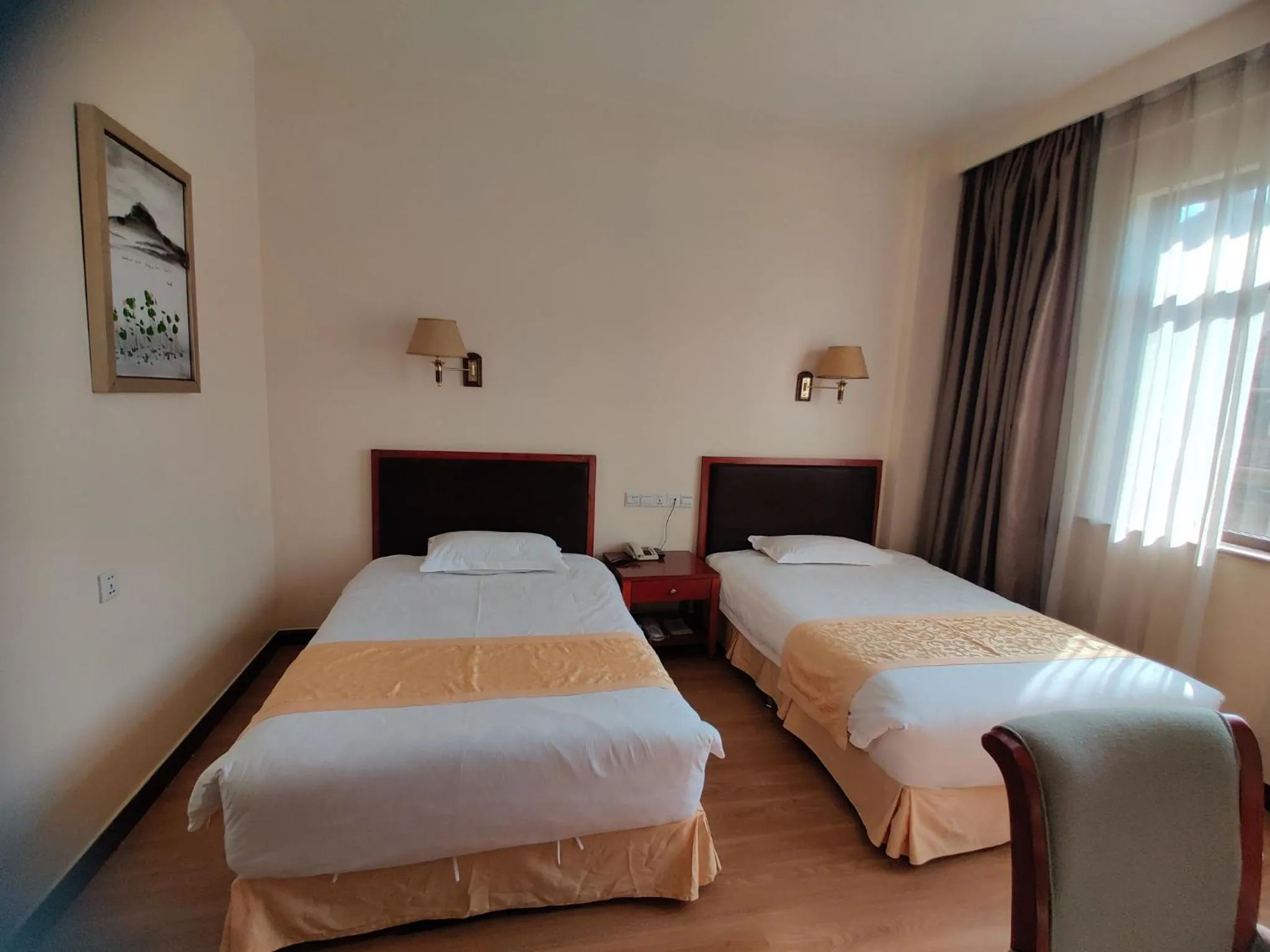 Bed in Soluxe Club International Hotel