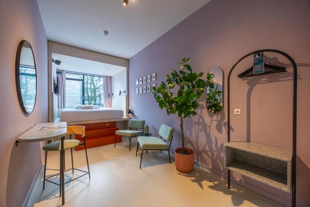 Bedroom in hotel emma next