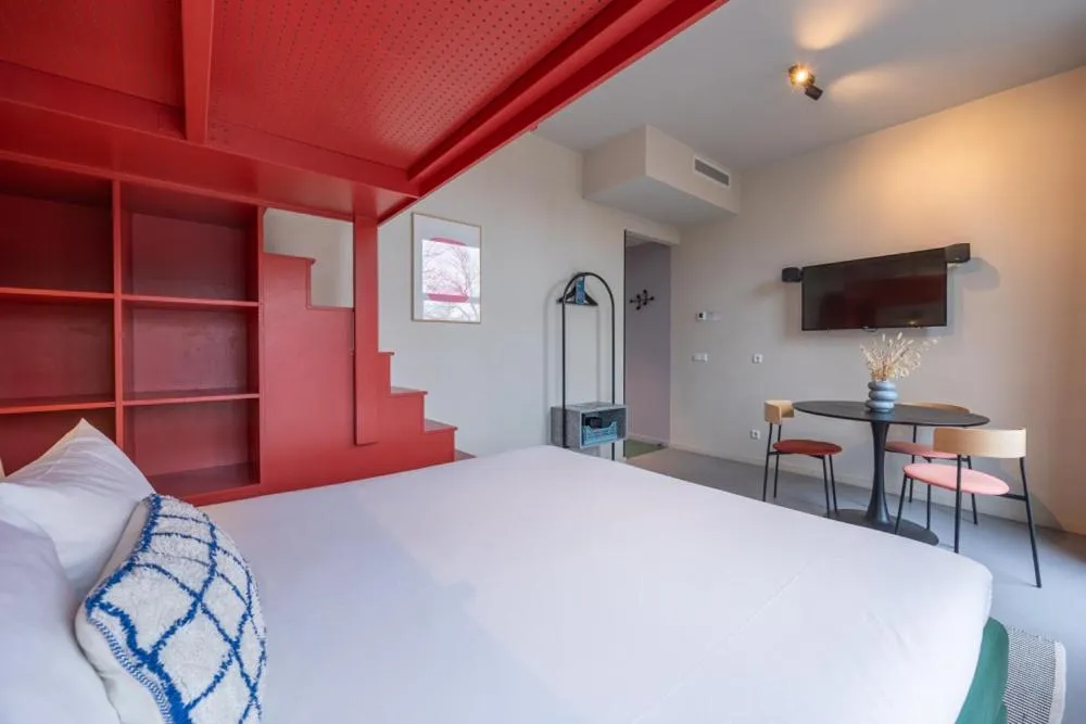 Bed in hotel emma next