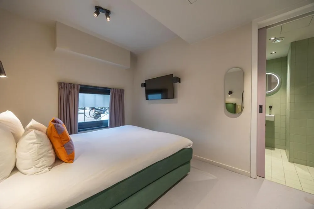 Bedroom, Bed in hotel emma next