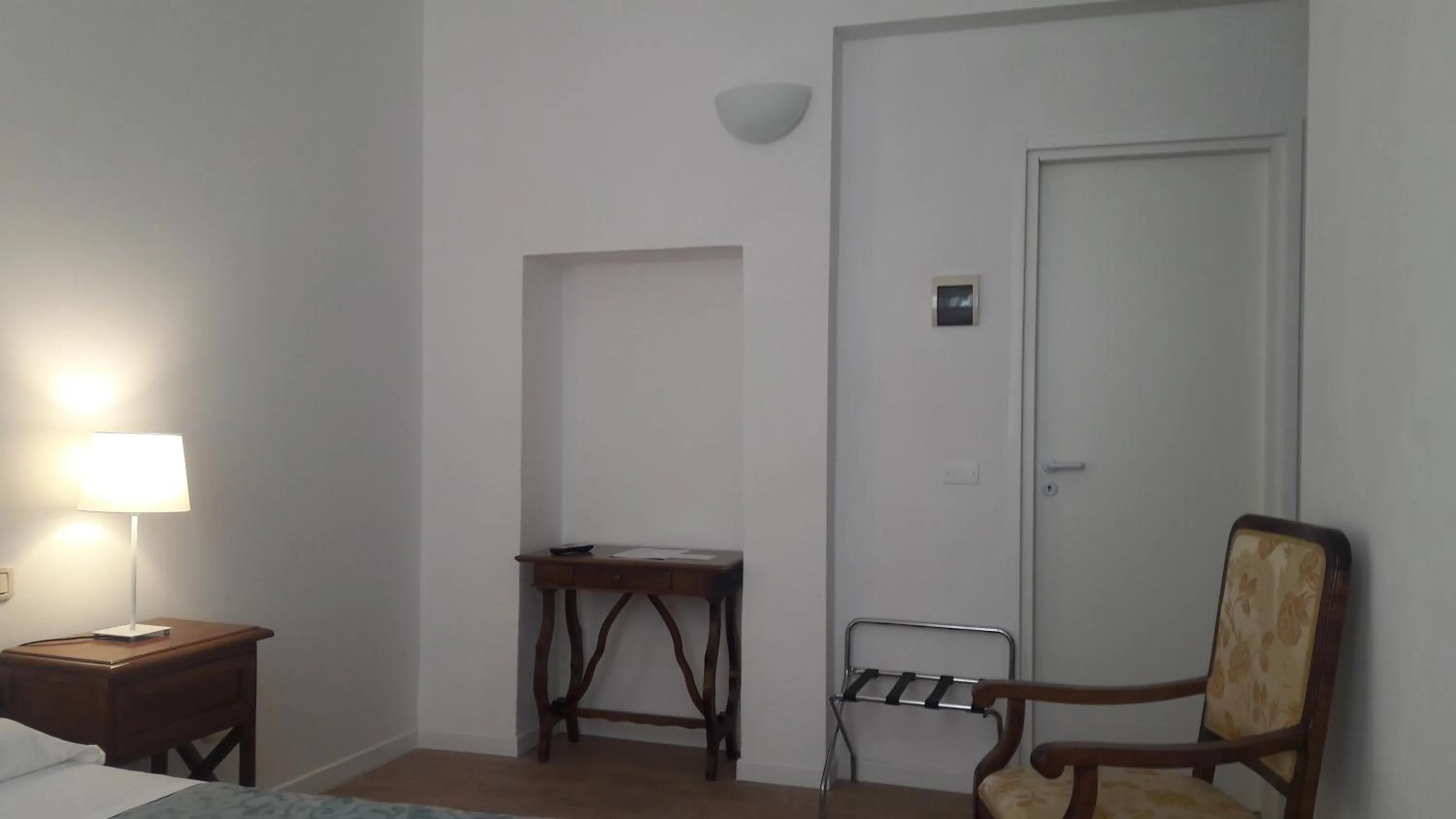 Bed in Il Grifo Camere e Suites