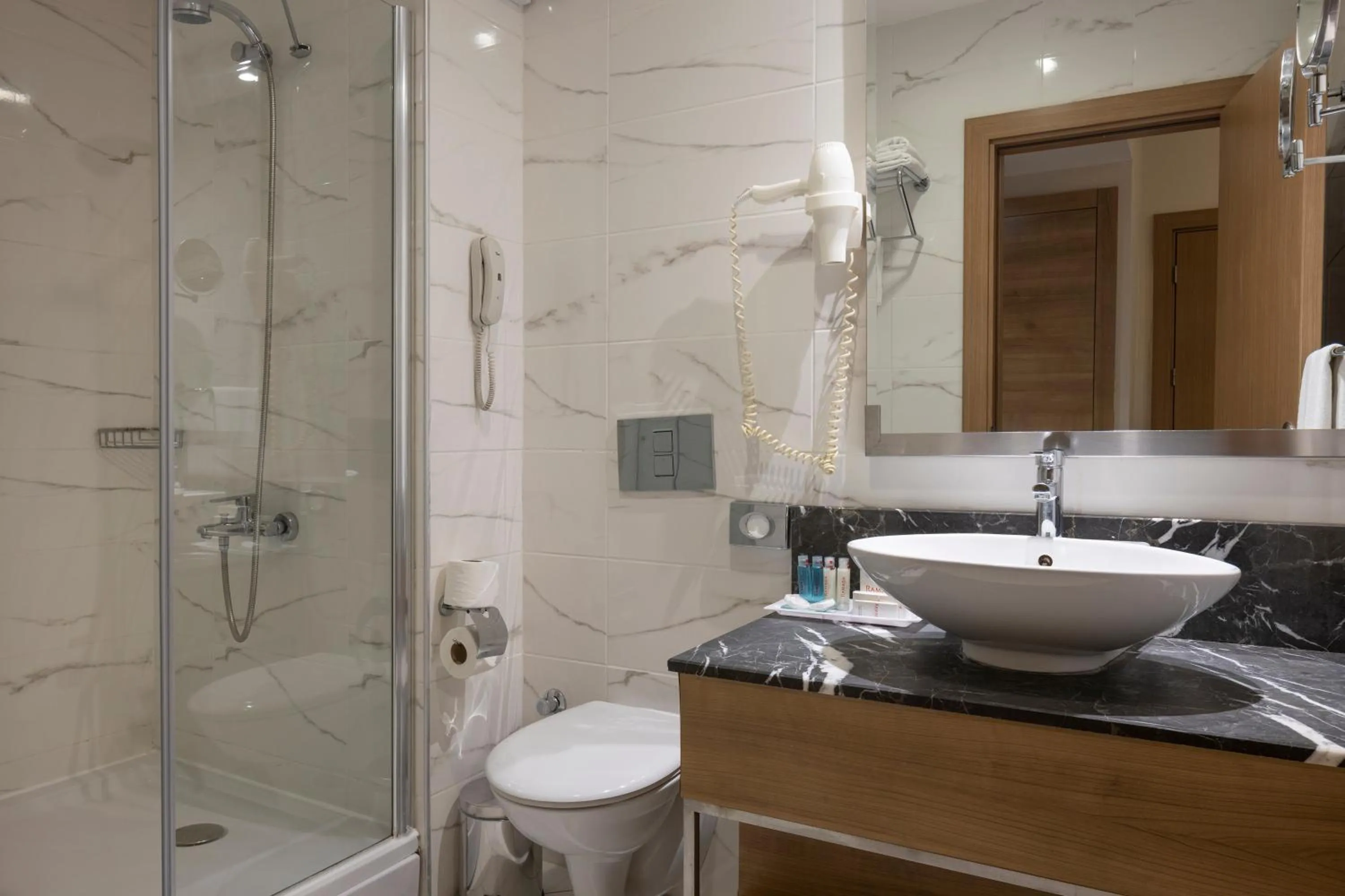 Shower in Ramada Resort By Wyndham Lara