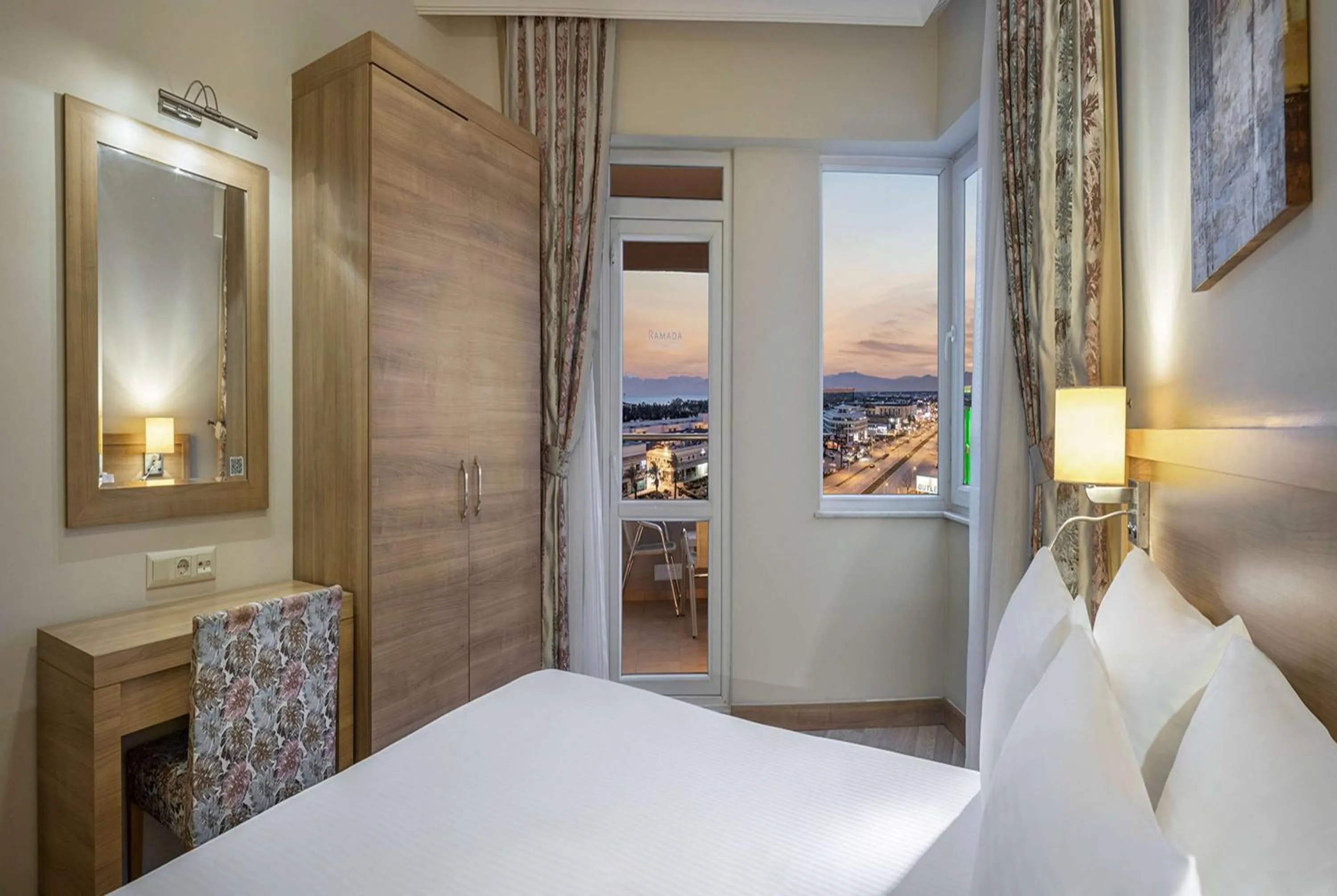 Photo of the whole room, Bed in Ramada Resort By Wyndham Lara