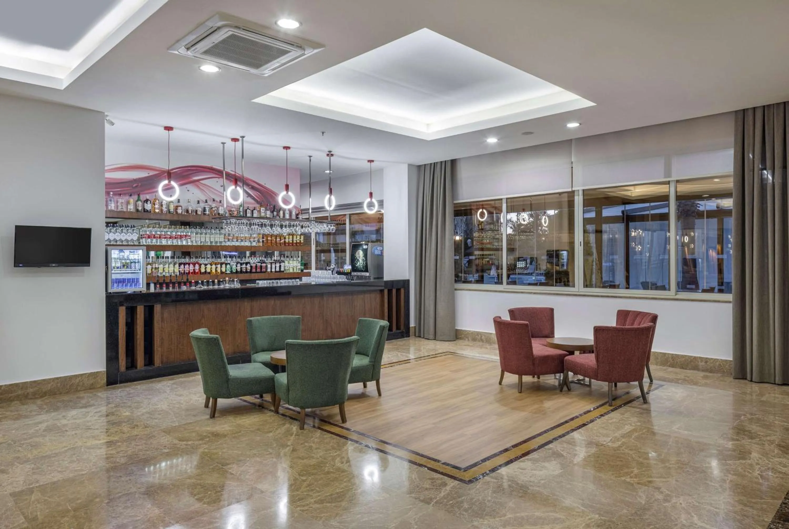 Lounge or bar in Ramada Resort By Wyndham Lara