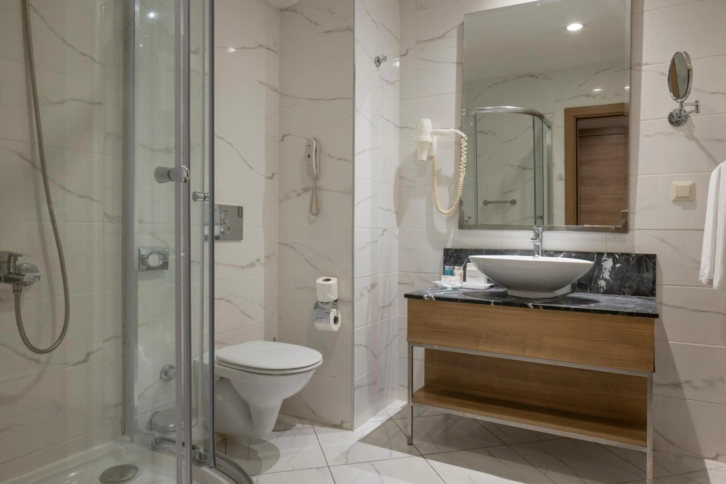 Shower in Ramada Resort By Wyndham Lara