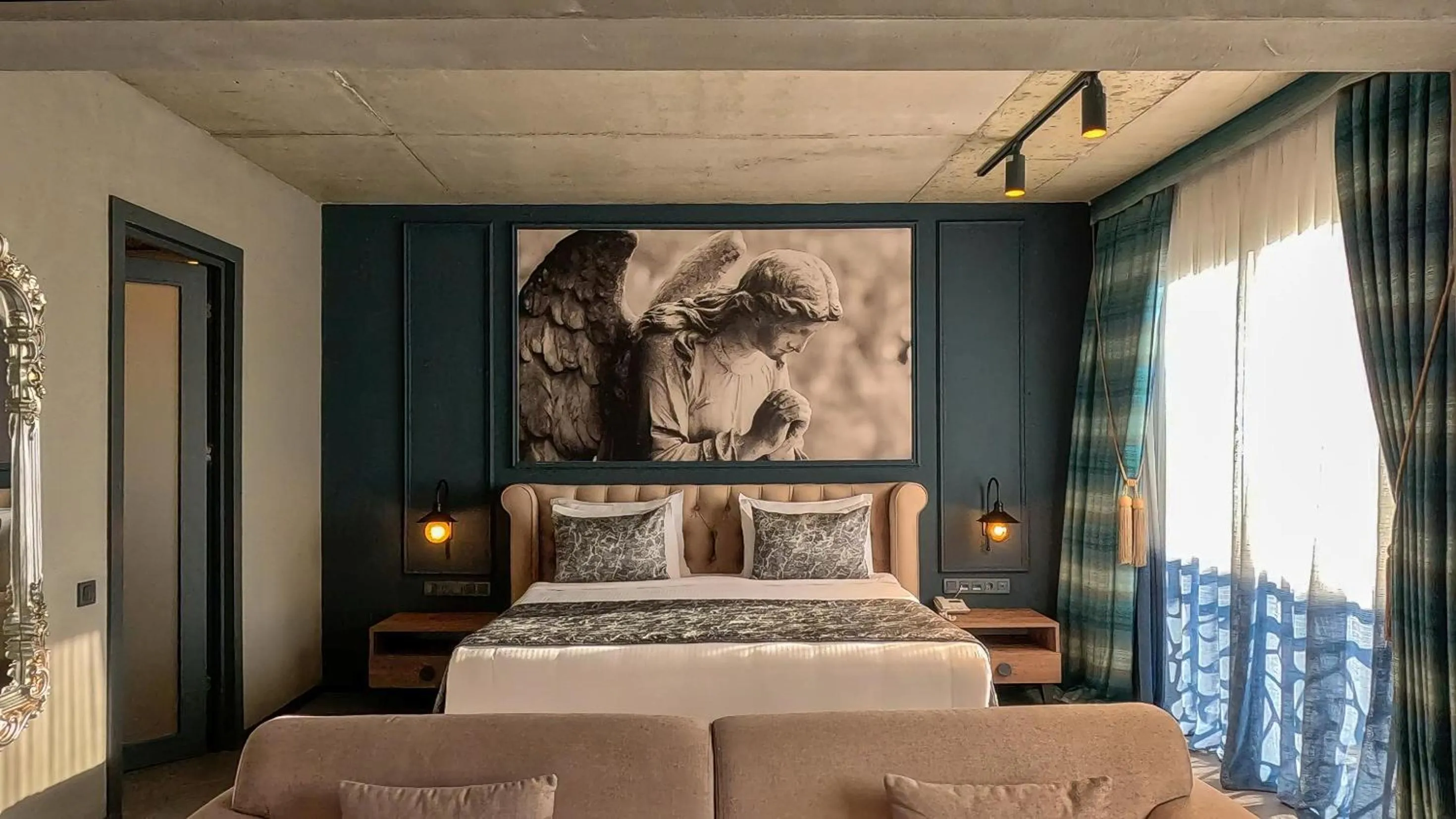 Bed in Sandora Boutiuqe Hotel