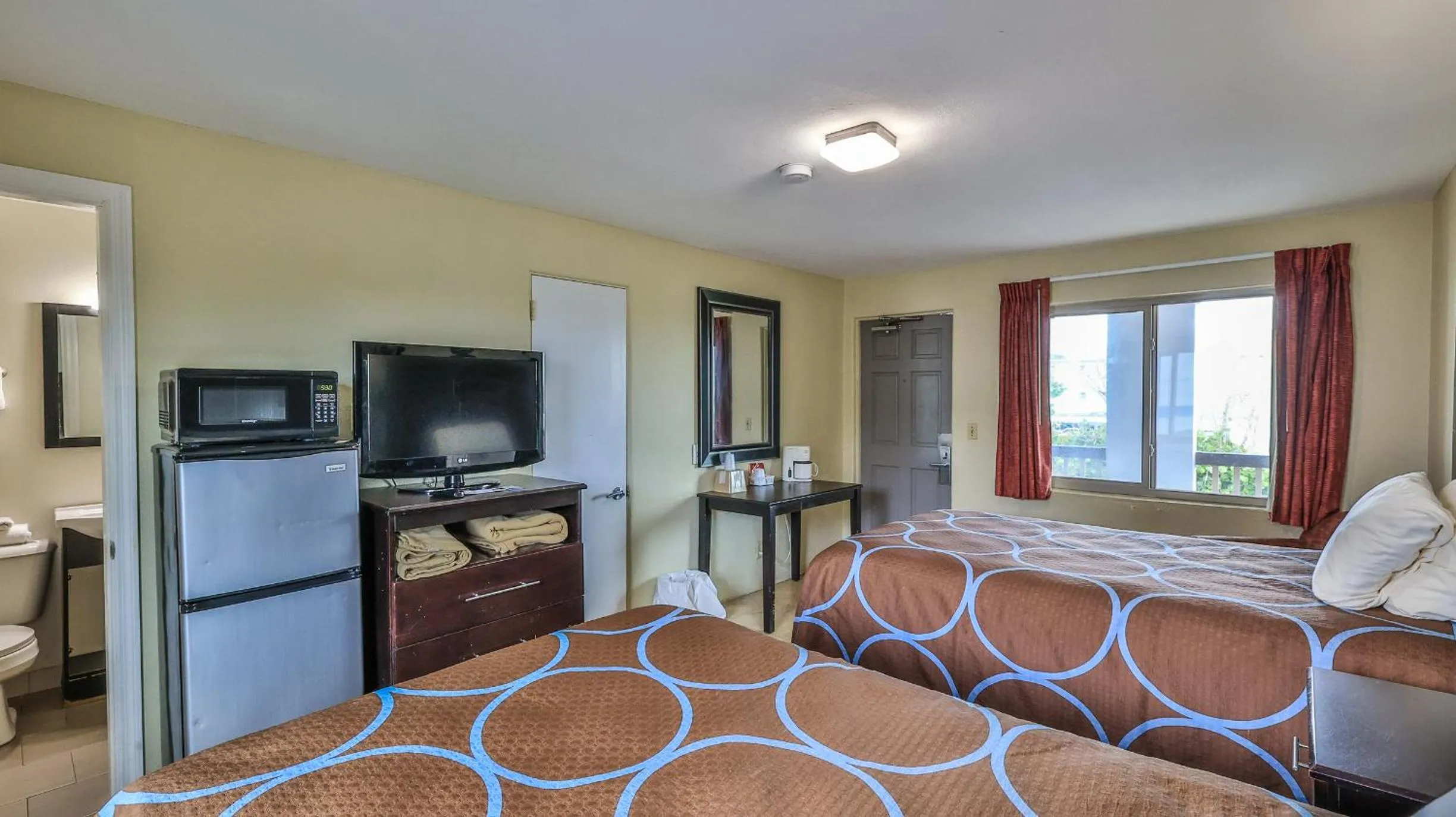 Bed in Driftwood Beach Motel