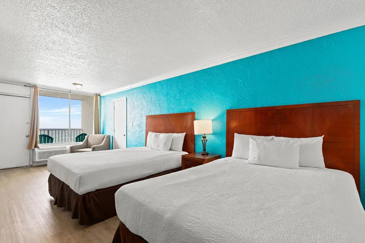 Bed in The Reef At Seahaven Beach Resorts