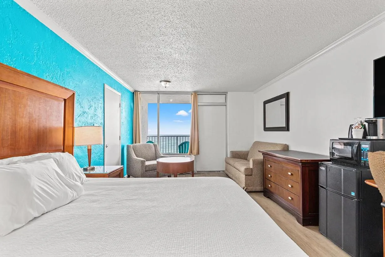 Bedroom, Bed in The Reef At Seahaven Beach Resorts
