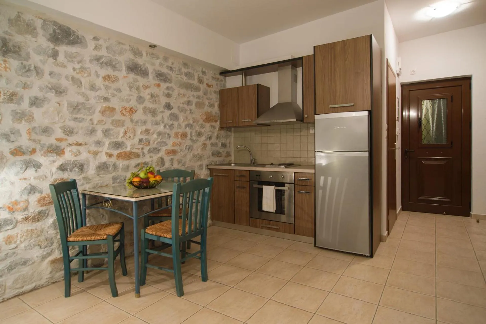 Kitchen or kitchenette in Vathi Hotel Apartment Hotel