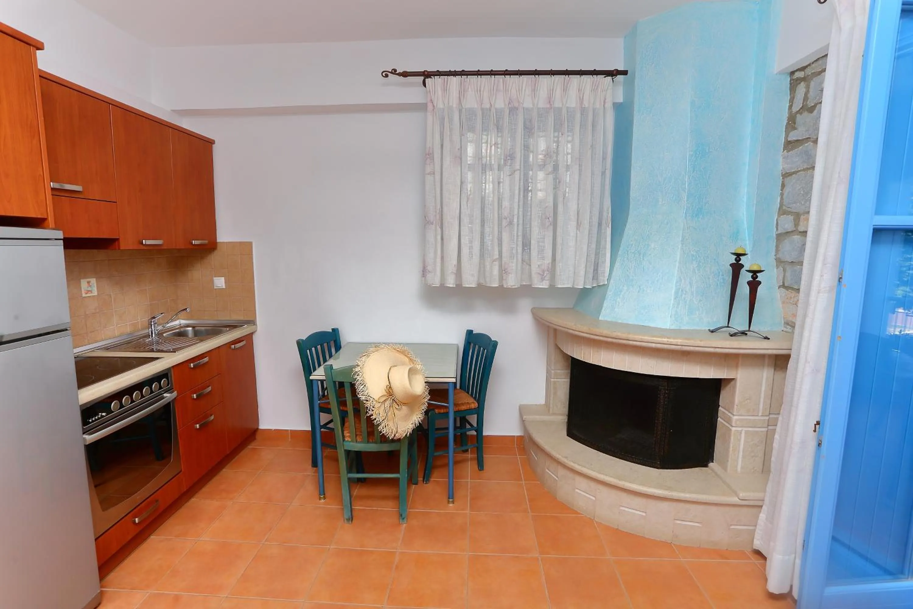 Kitchen or kitchenette in Vathi Hotel Apartment Hotel