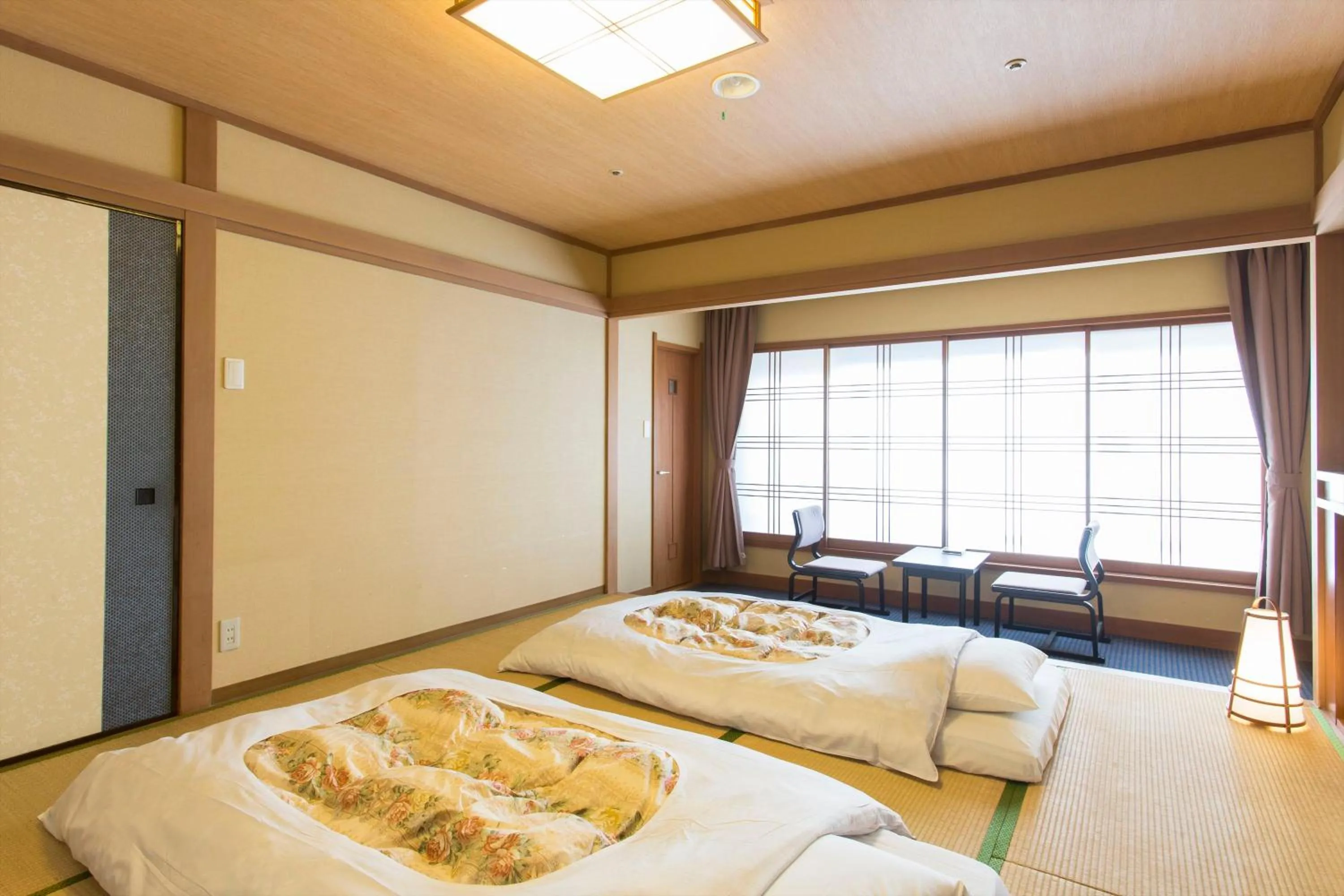 Photo of the whole room, Bed in Ito Kowakien