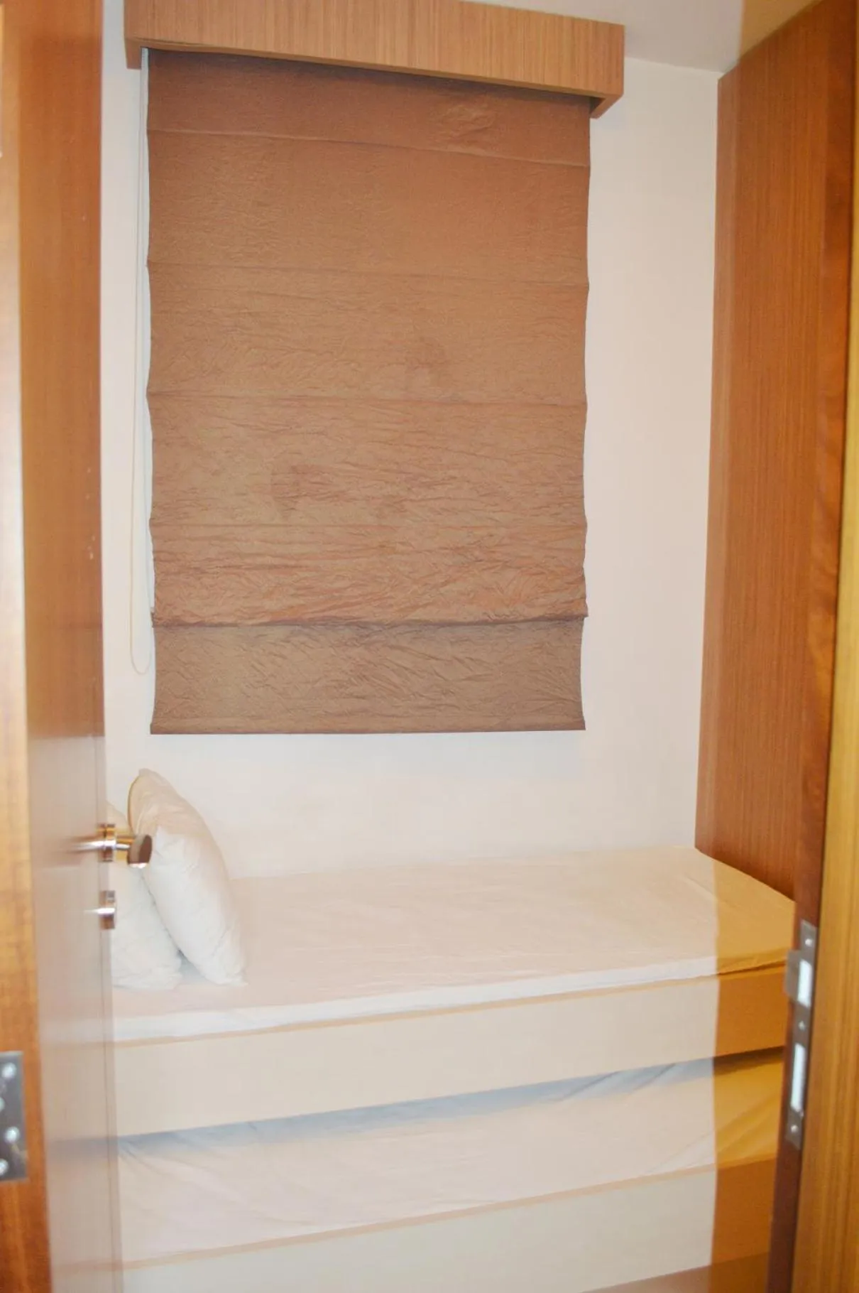 Bed in Hayali Suites