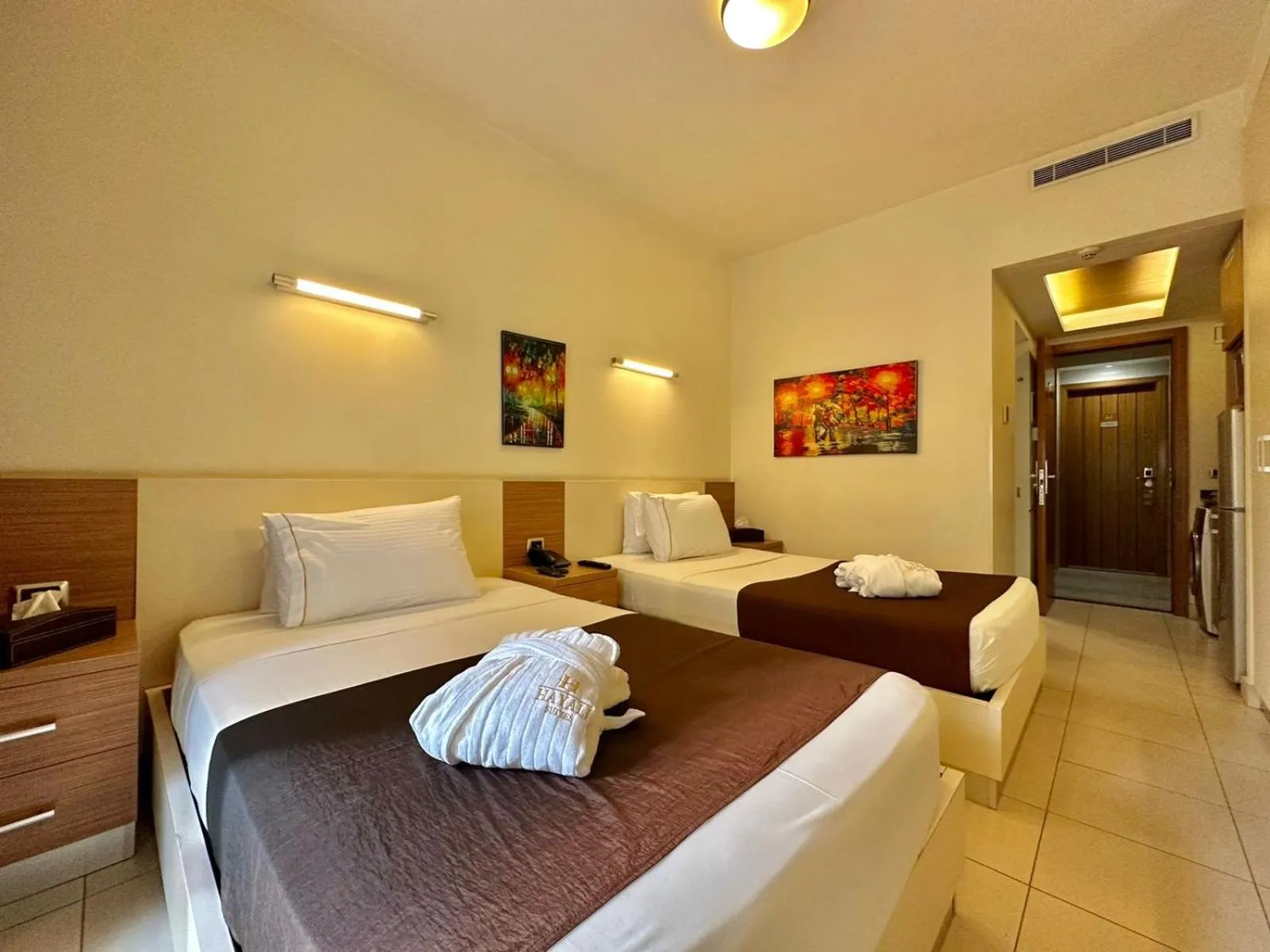 Bed in Hayali Suites