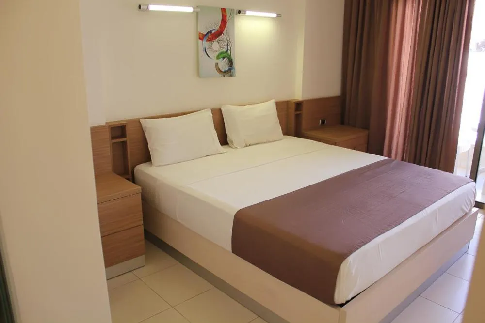 Bed in Hayali Suites