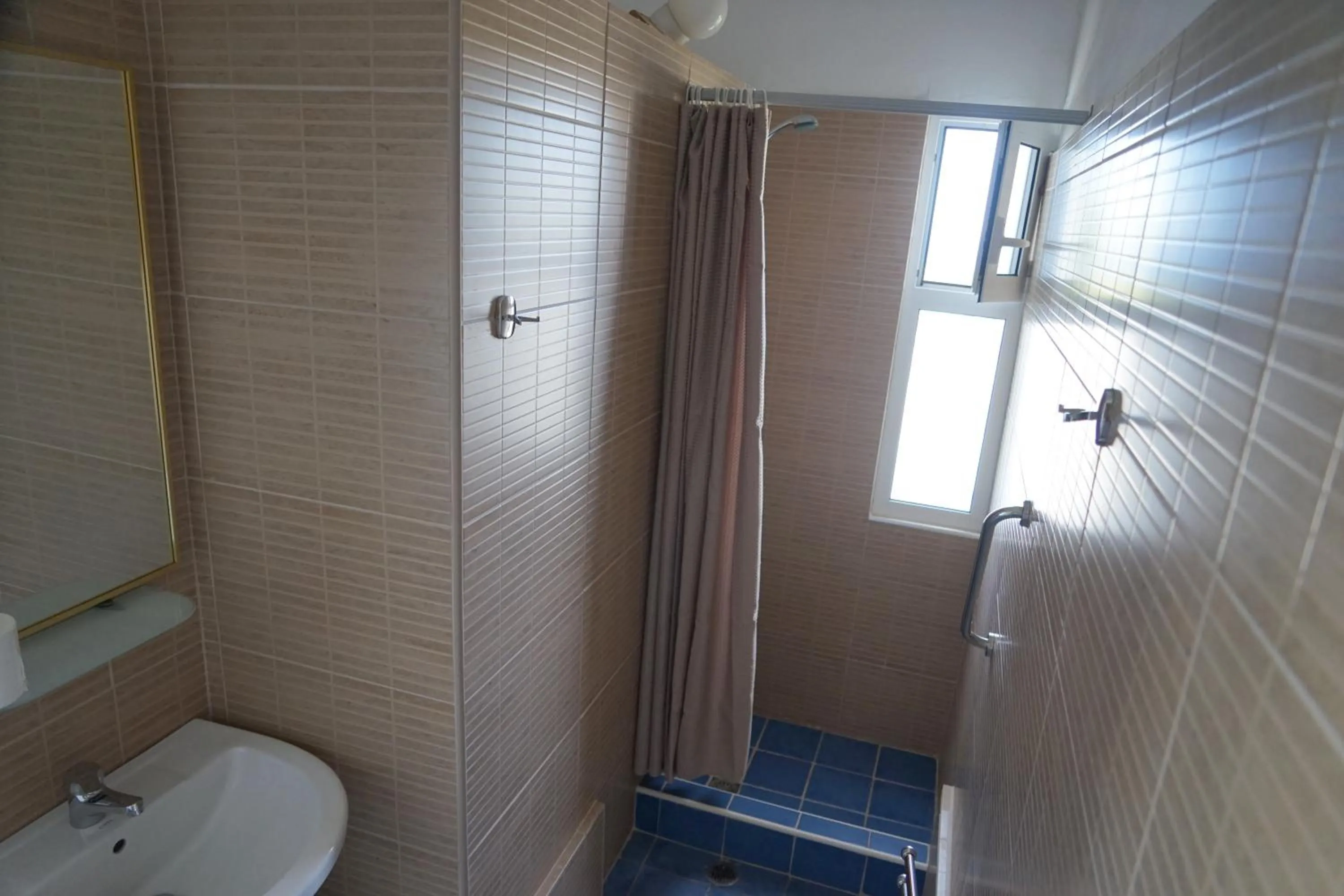 Bathroom in Akrotiri Hotel