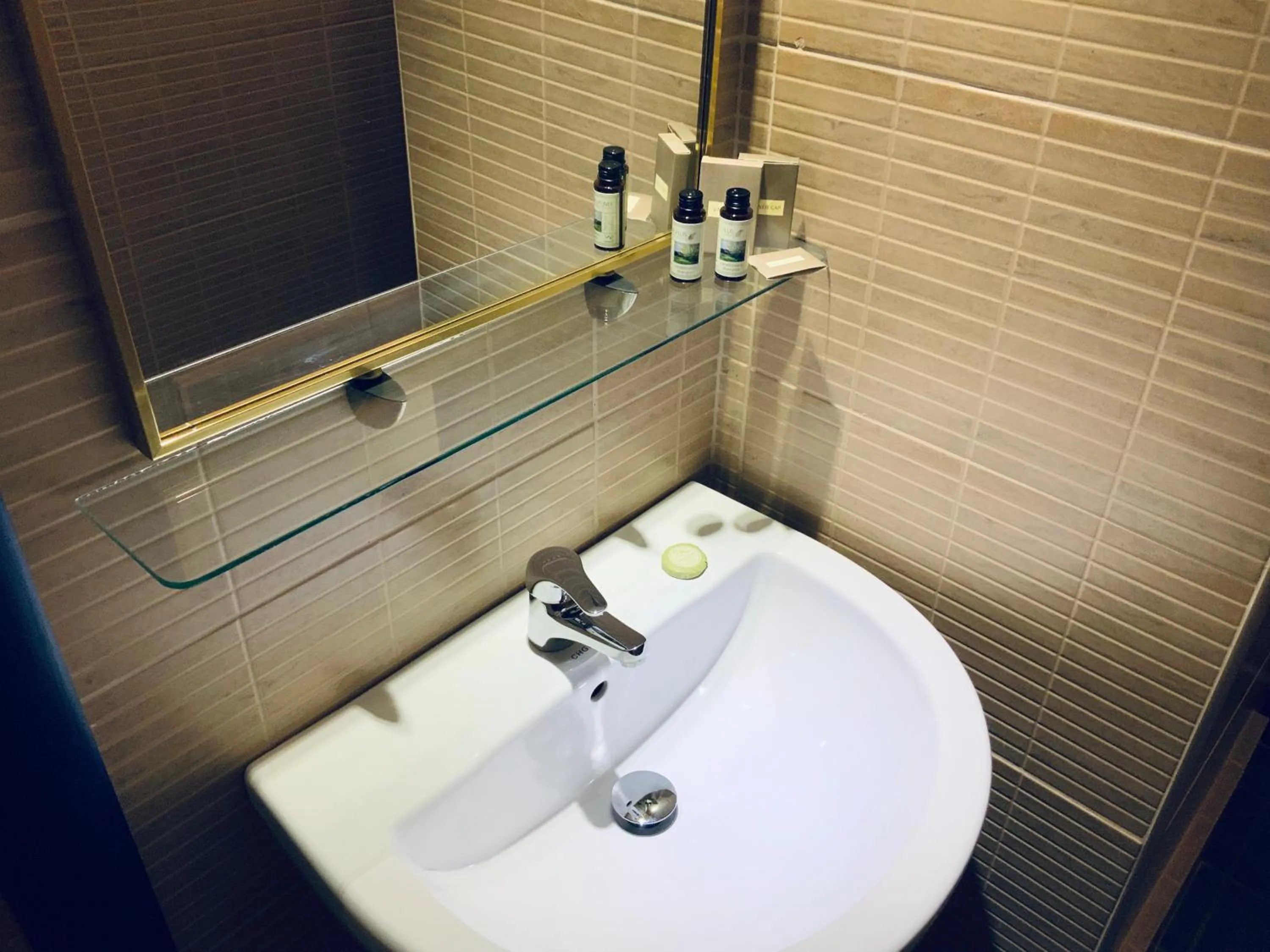 Bathroom in Akrotiri Hotel