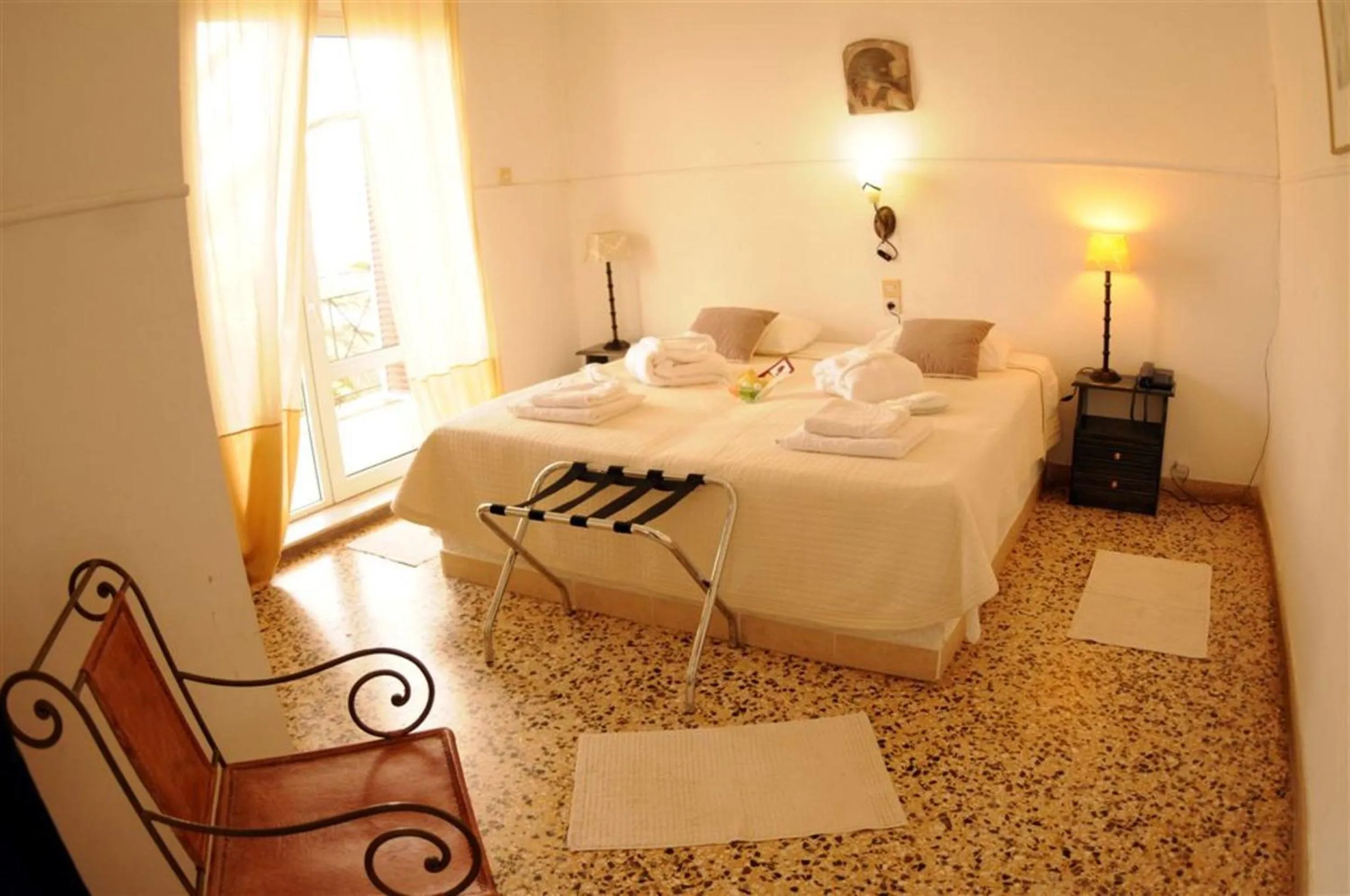 Bed in Akrotiri Hotel