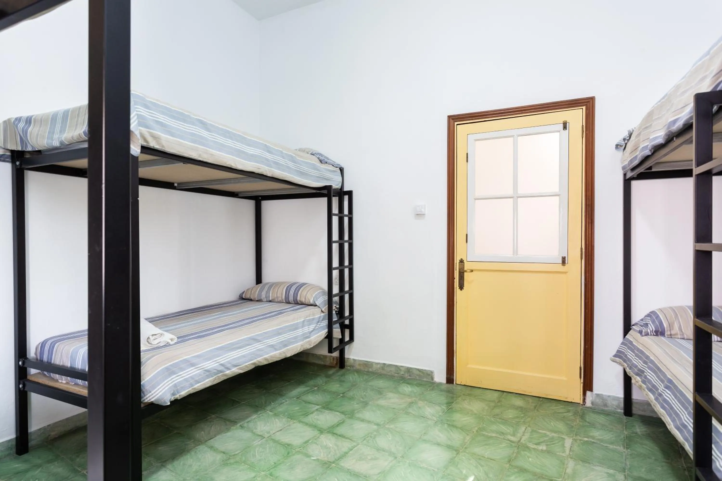 Bed in El Hostal del Cubo