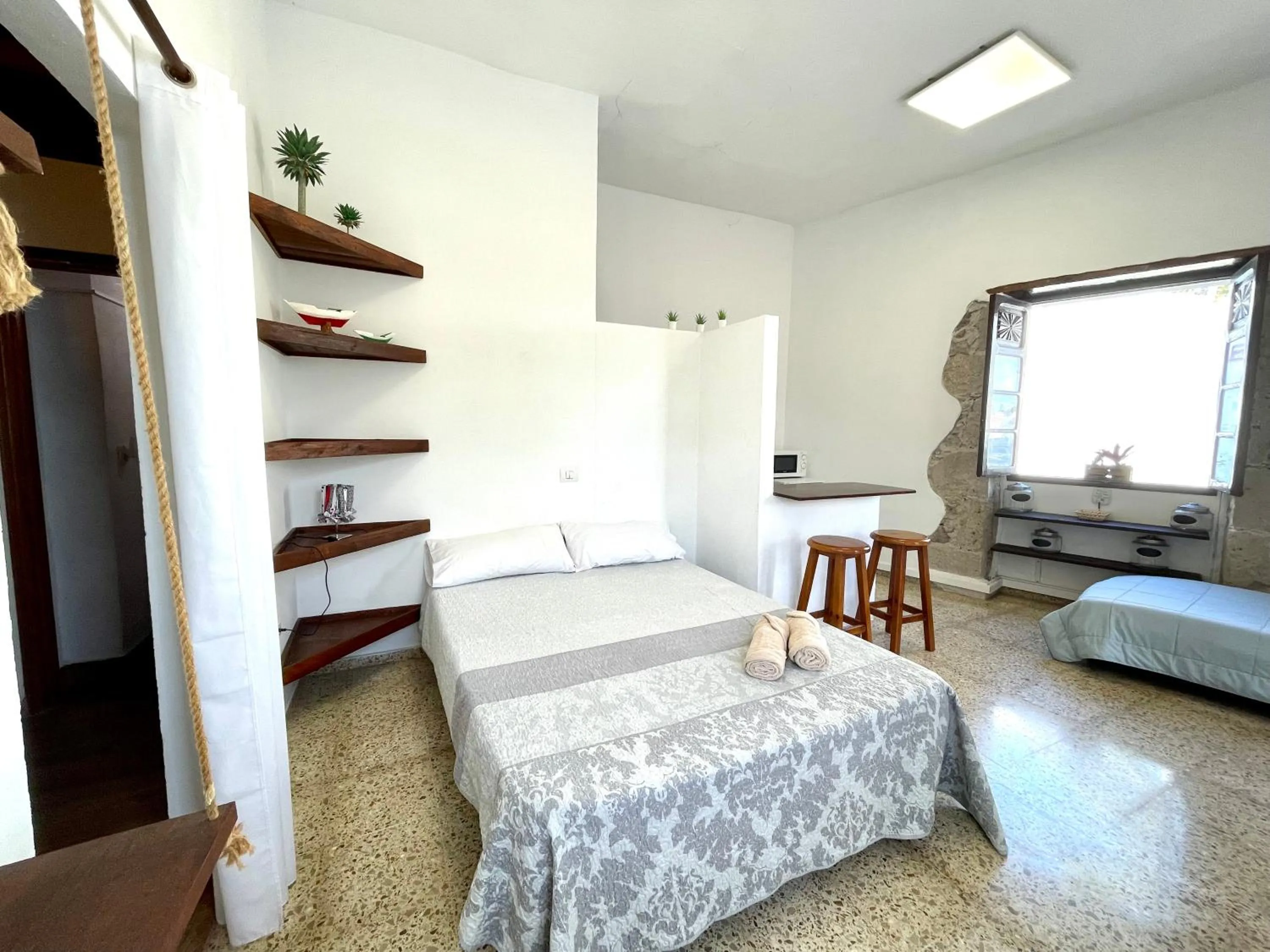 Bed in El Hostal del Cubo