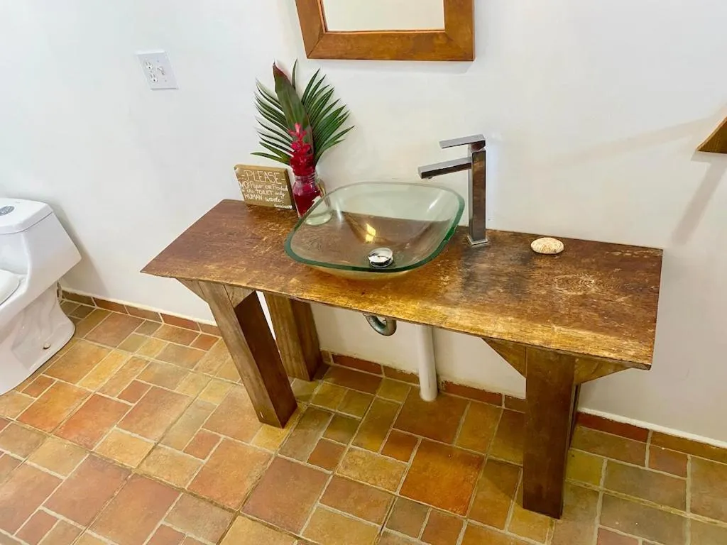 Toilet in Bird Island Bungalows