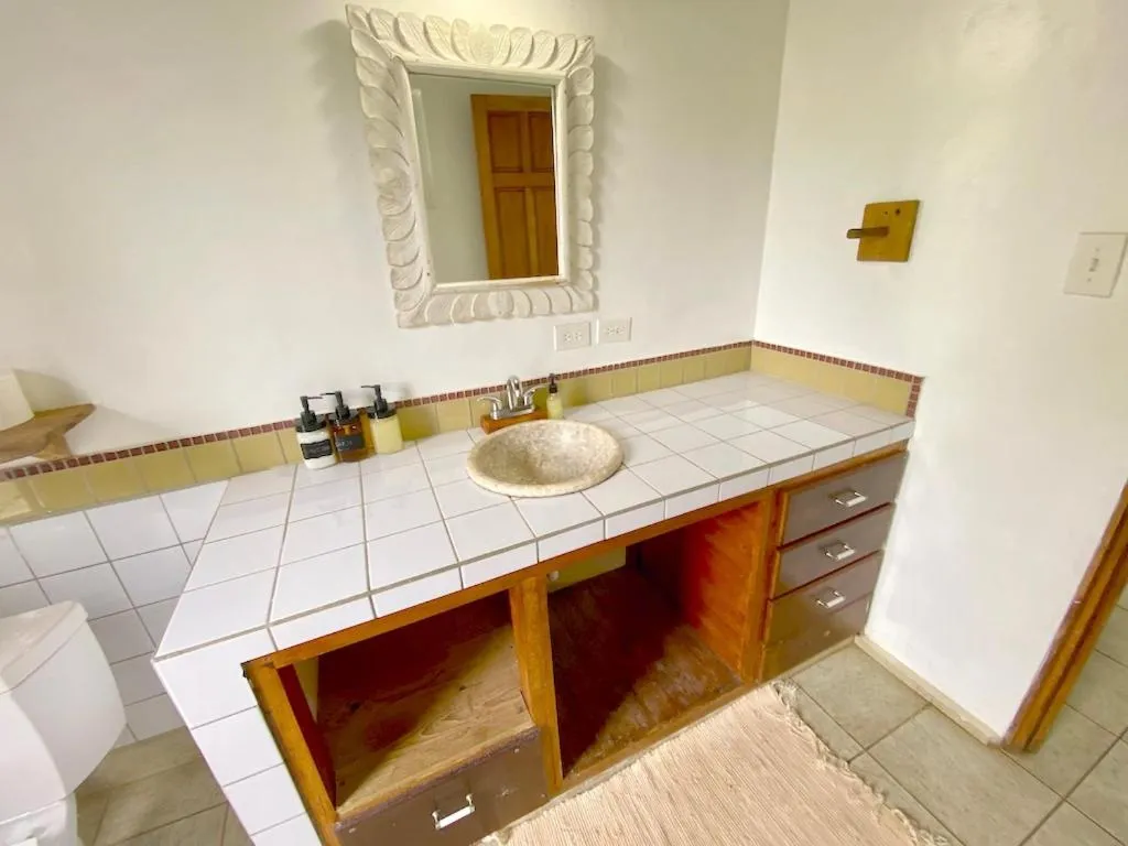 Bathroom in Bird Island Bungalows