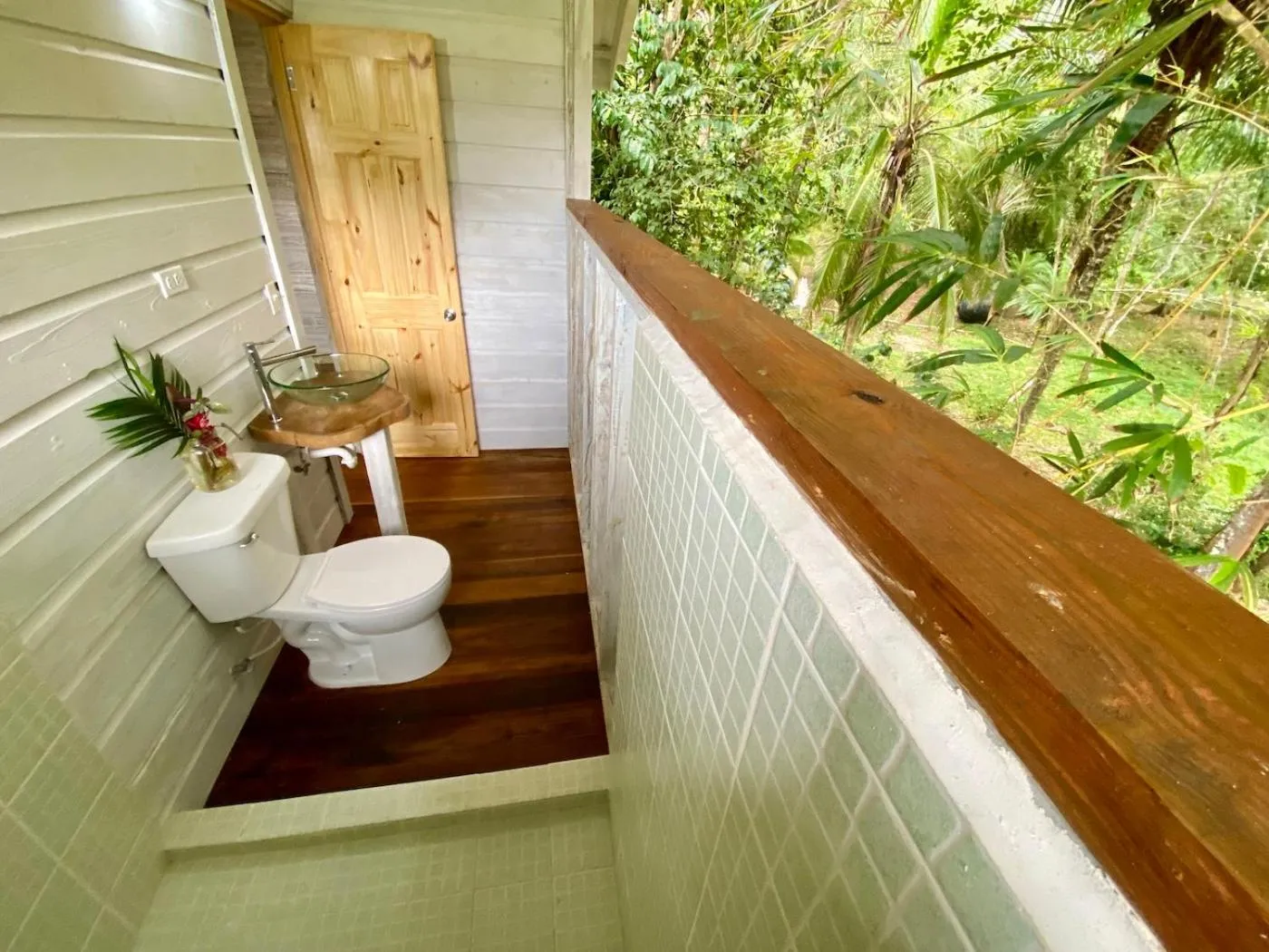 Toilet in Bird Island Bungalows