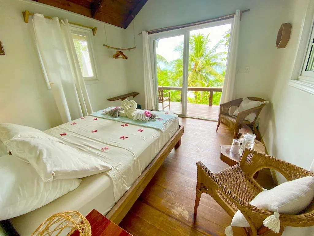 Balcony/Terrace, Bed in Bird Island Bungalows