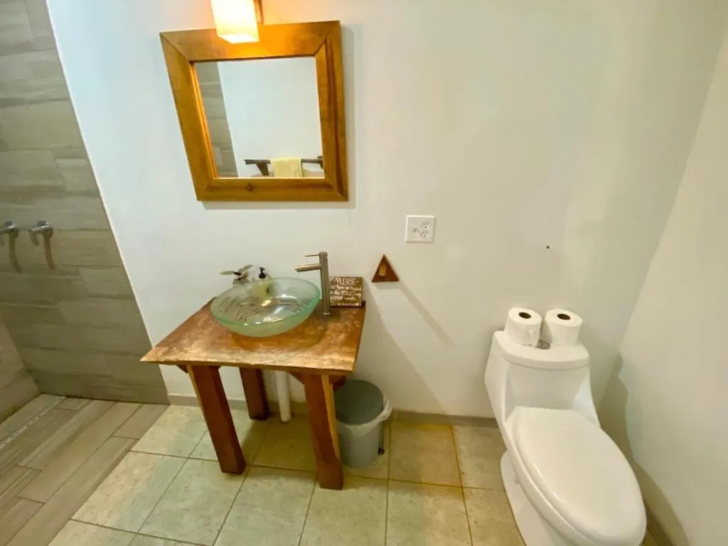 Bathroom in Bird Island Bungalows
