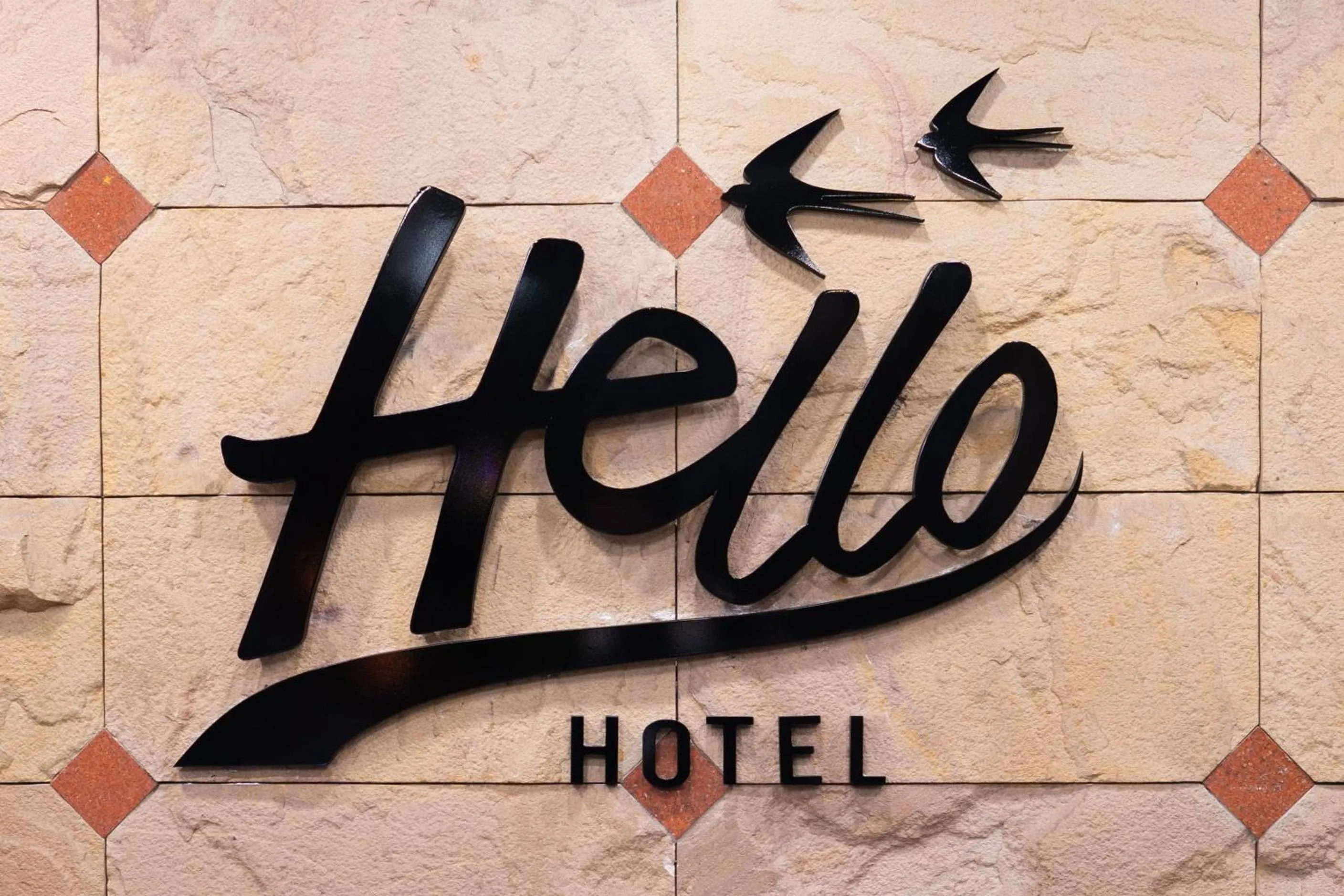 Property logo or sign in Betong Hello Hotel