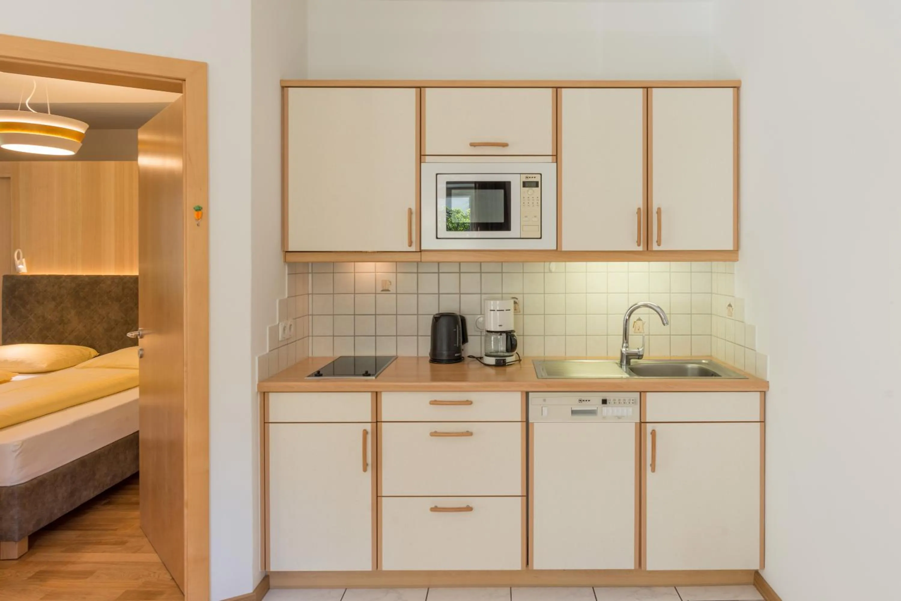 Kitchen or kitchenette, Bed in Apartments Villa Majense
