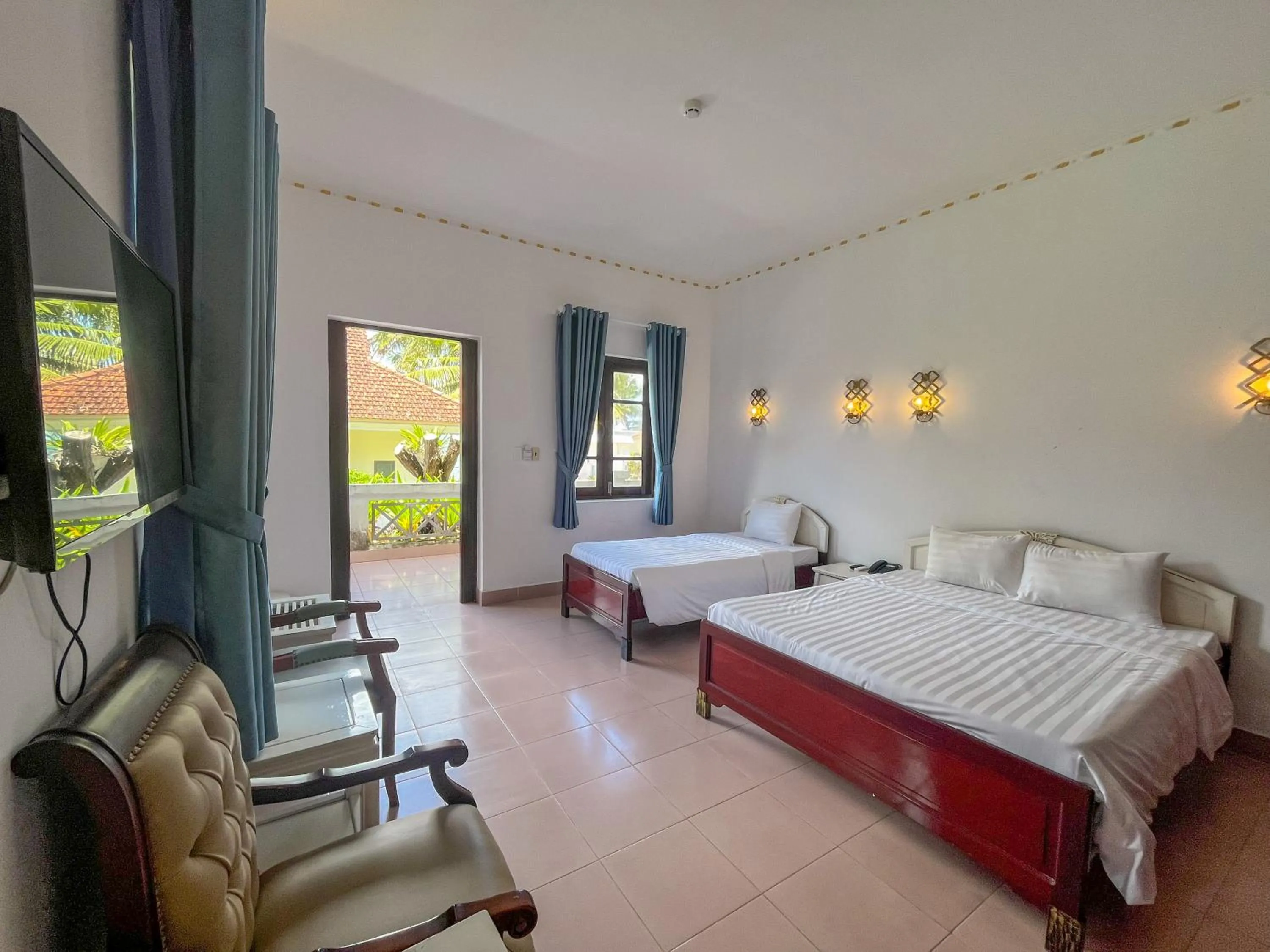 Seating area, Bed in Hawaii Resort Phu Quoc