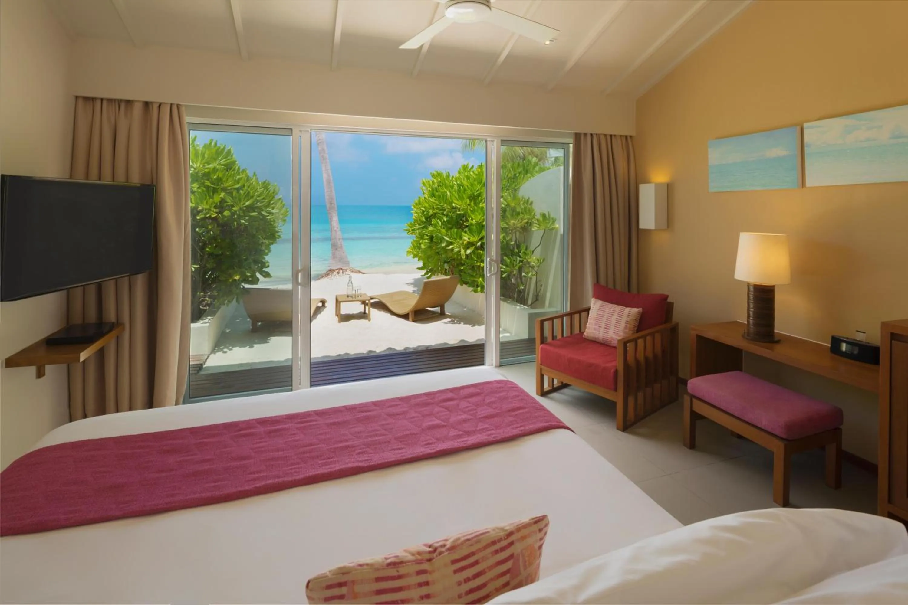 View (from property/room), Bed in Centara Ras Fushi Resort & Spa Maldives - 50 percent discount on transfers for min 4 nights stay and more, valid for reservations between 11th Feb till 22 Dec 2025