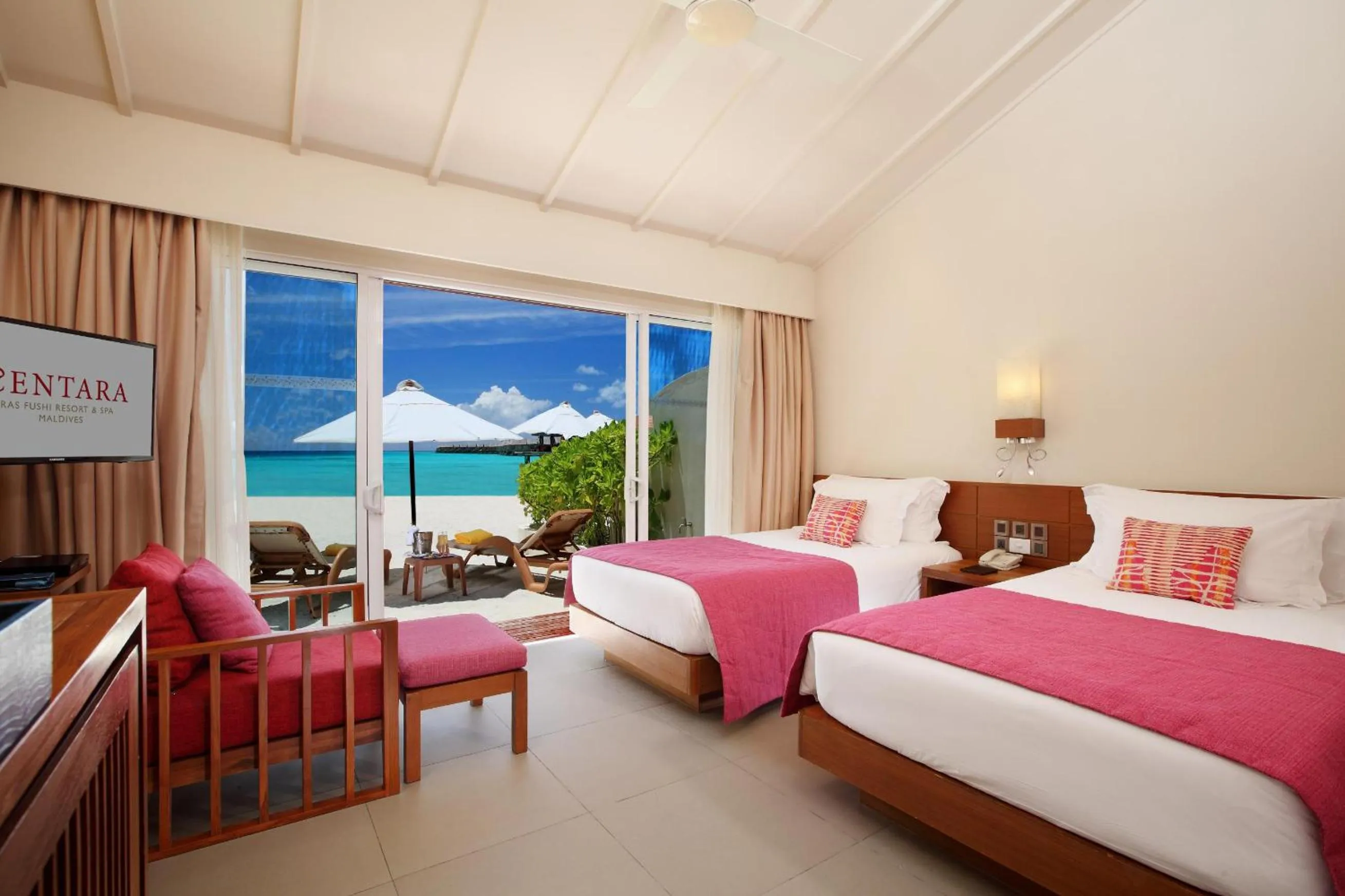 Photo of the whole room, Bed in Centara Ras Fushi Resort & Spa Maldives - 50 percent discount on transfers for min 4 nights stay and more, valid for reservations between 11th Feb till 22 Dec 2025