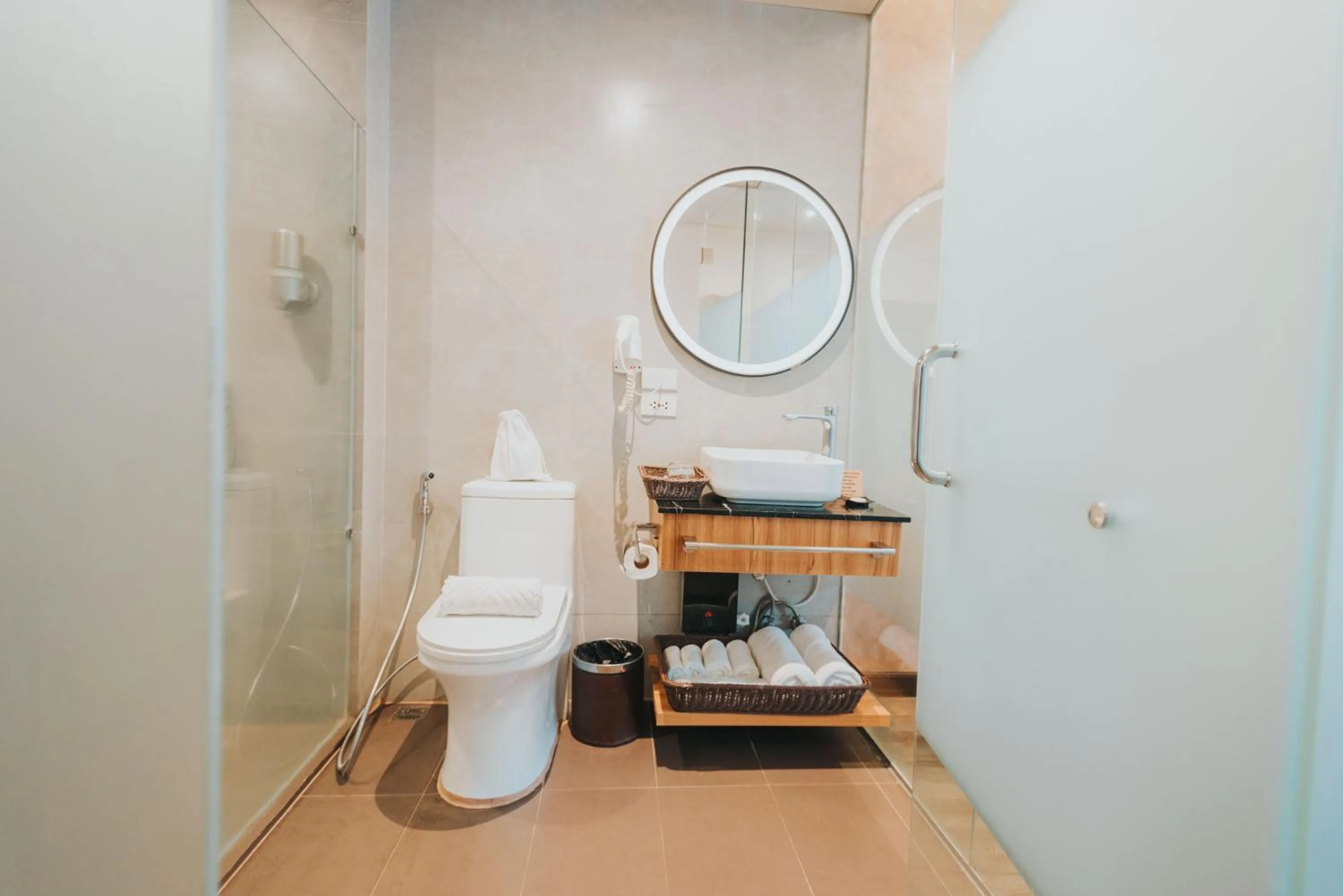 Bathroom in SureStay Plus Hotel by Best Western AC LUXE Angeles City