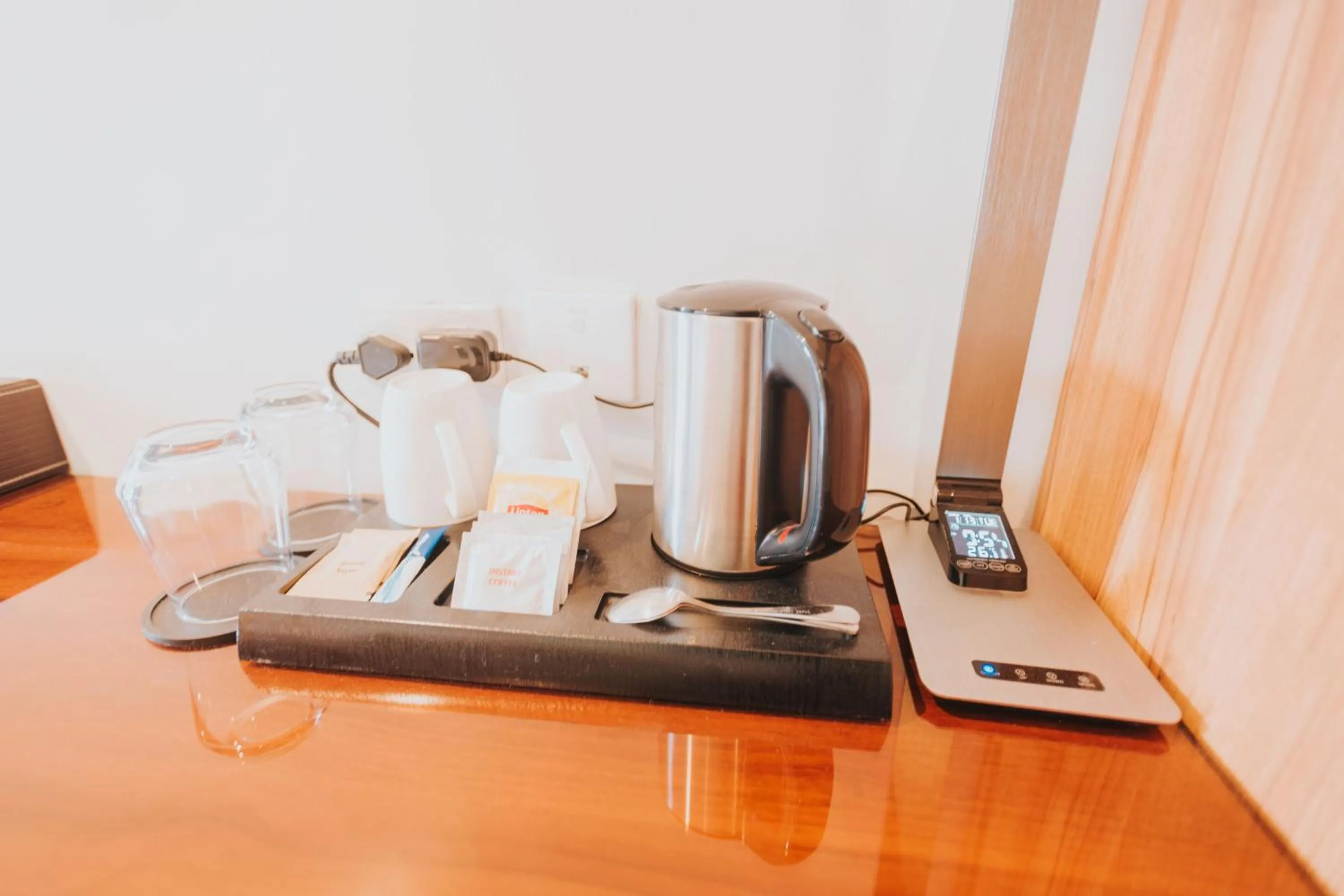 Coffee/tea facilities in SureStay Plus Hotel by Best Western AC LUXE Angeles City