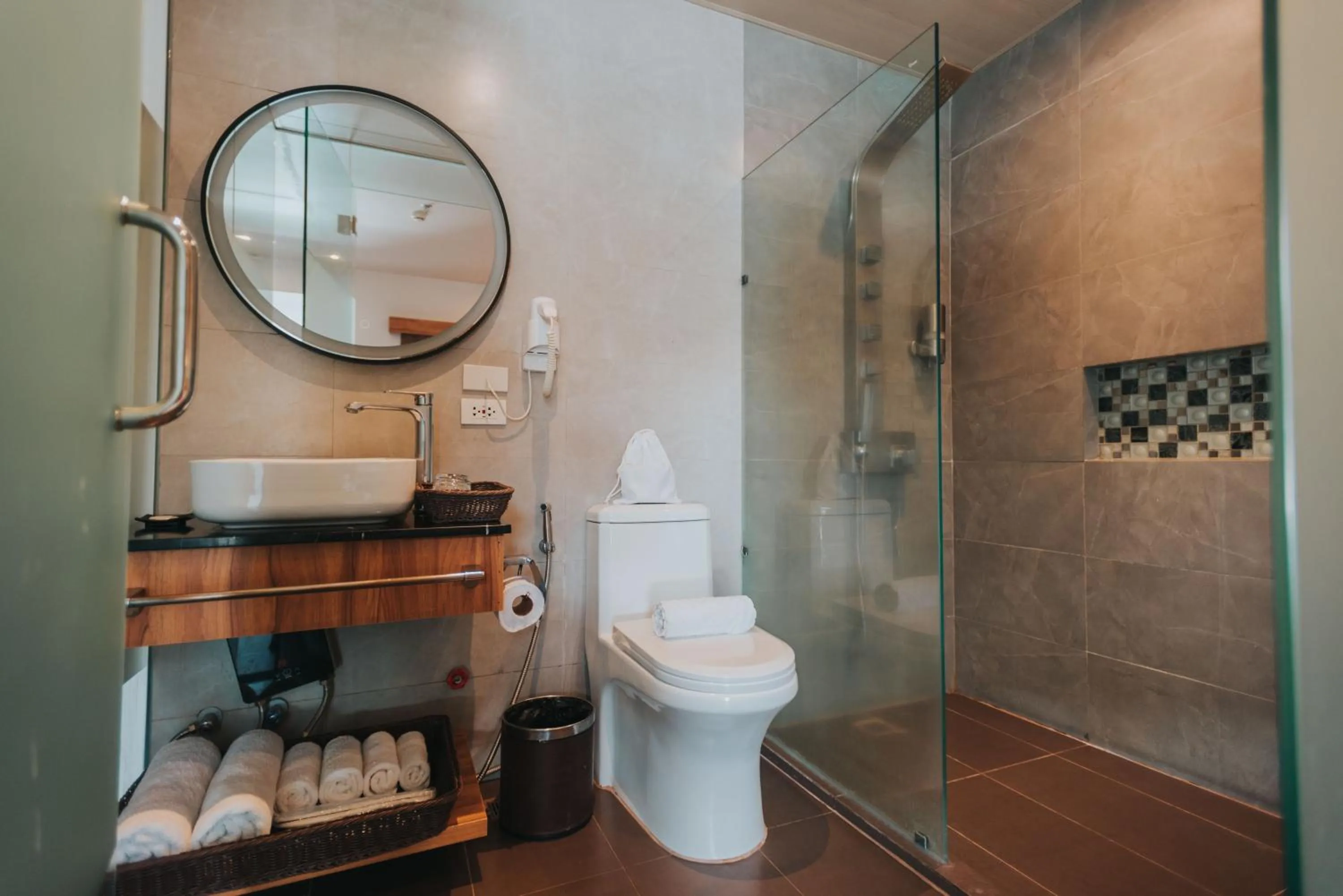 Bathroom in SureStay Plus Hotel by Best Western AC LUXE Angeles City