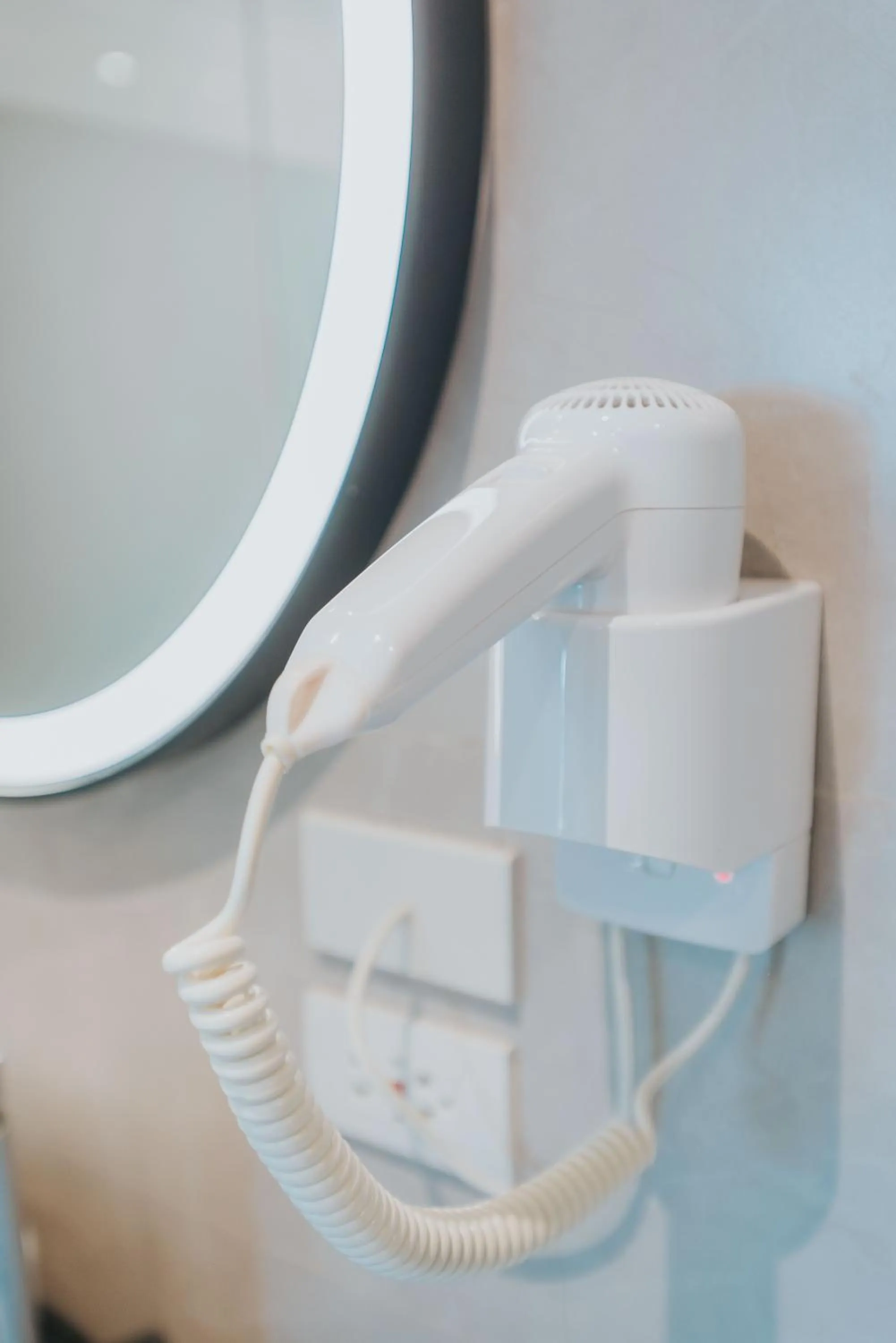 Bathroom in SureStay Plus Hotel by Best Western AC LUXE Angeles City