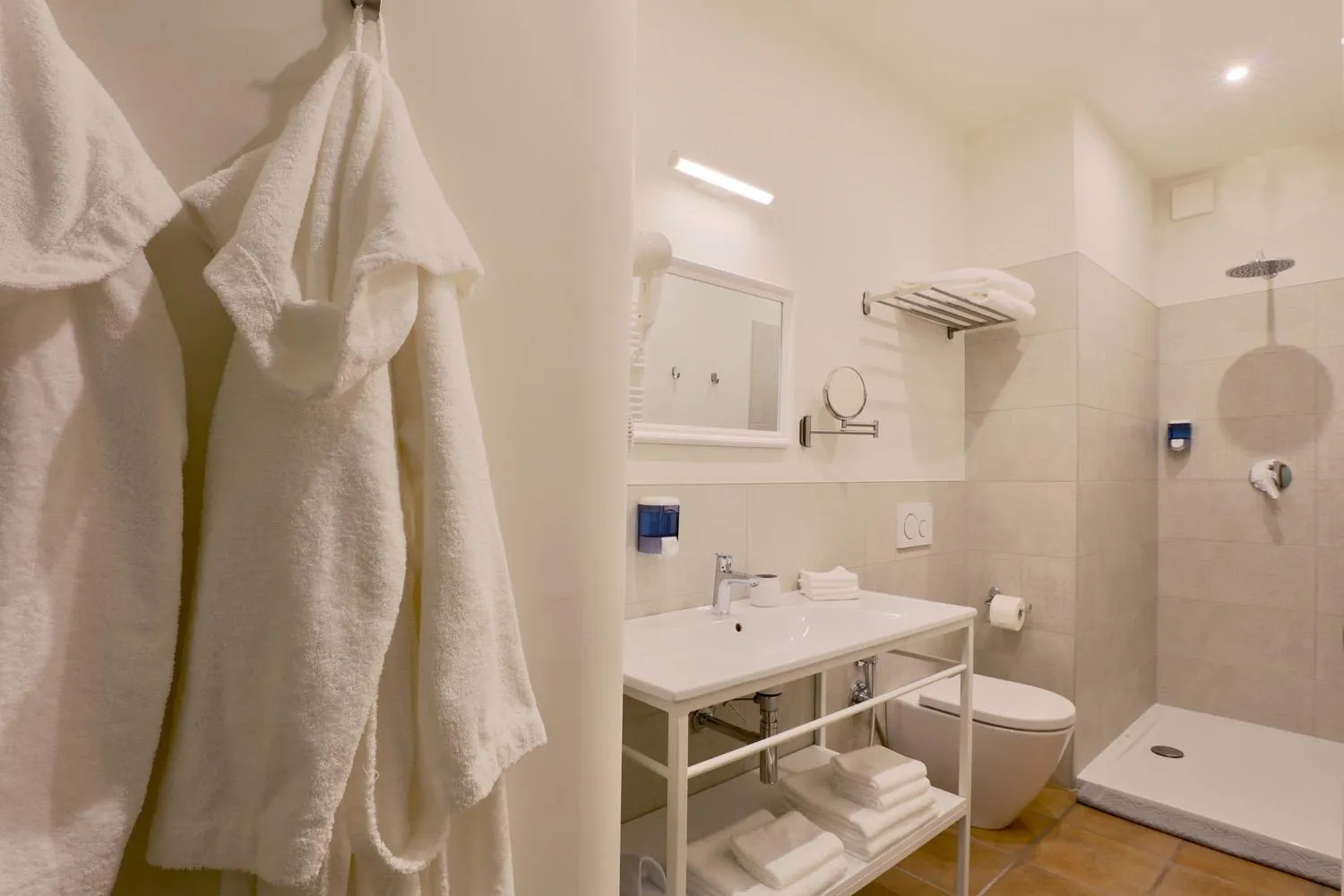 Shower in LE SETTE VIE HOLIDAY HOMES