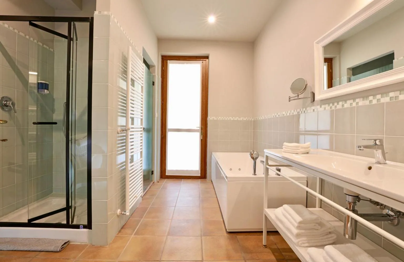 Shower in LE SETTE VIE HOLIDAY HOMES
